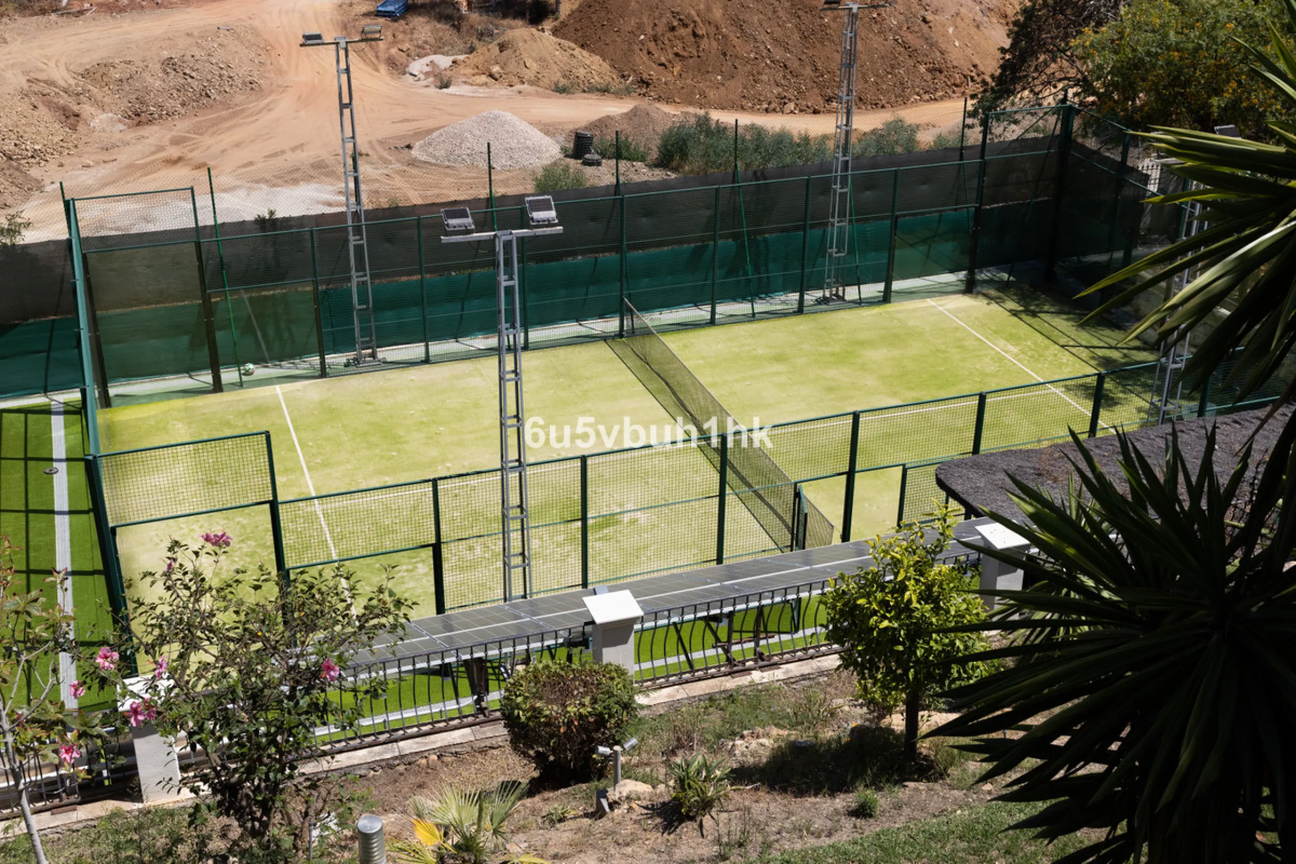 Nestled on a spacious 3,920 square meter plot, this generational Estate boasts a total built area of 842 square meters, spread across four floors with an elevator, located in one of Marbella's prime urbanizations. Surrounded by the lush nature of Las Chap
