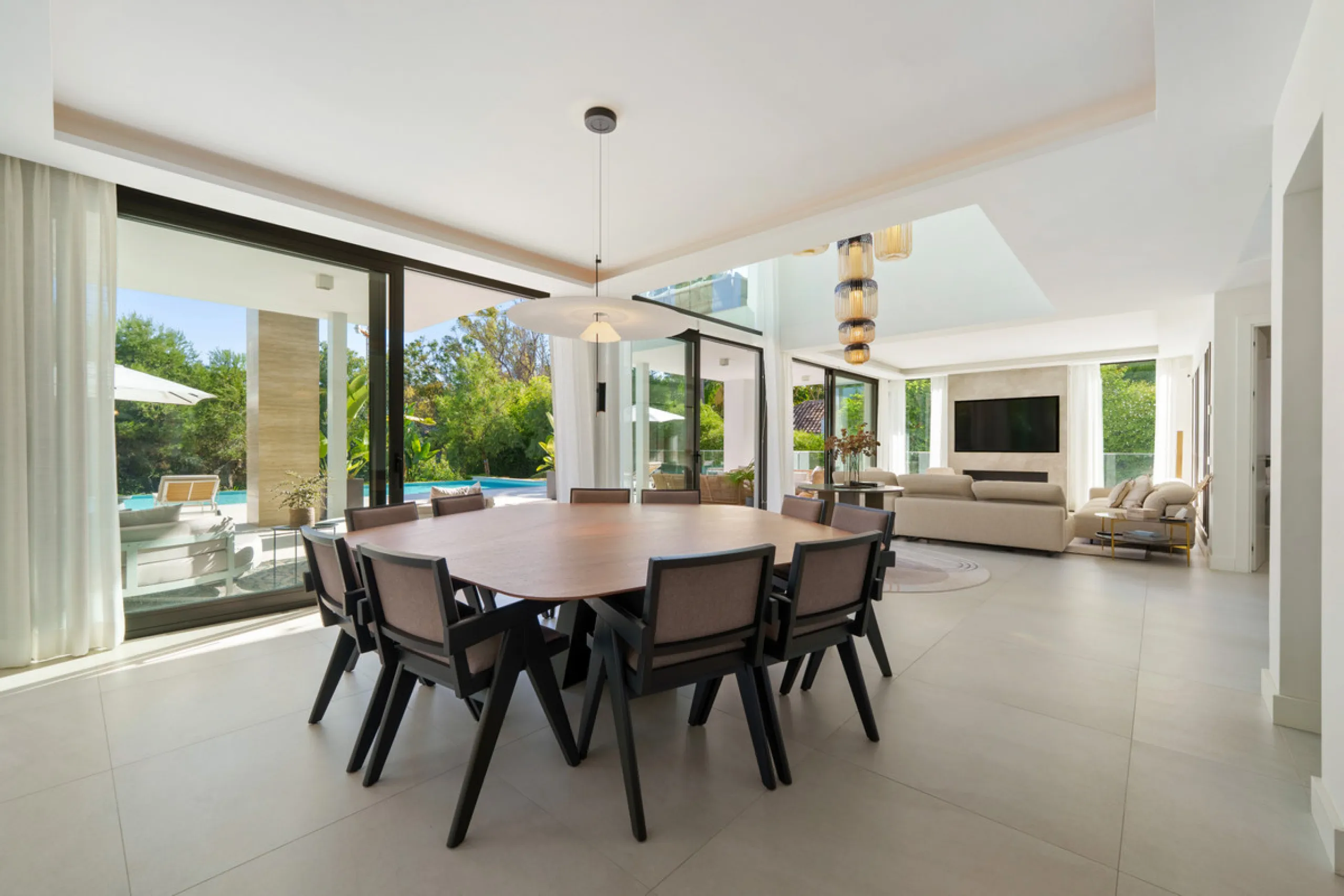 Nestled in the prestigious Altos de Puente Romano on Marbella's Golden Mile, Villa Romano is the epitome of modern Mediterranean luxury. This striking six-bedroom, six-bathroom residence blends sleek contemporary architecture with warm natural tones, crea