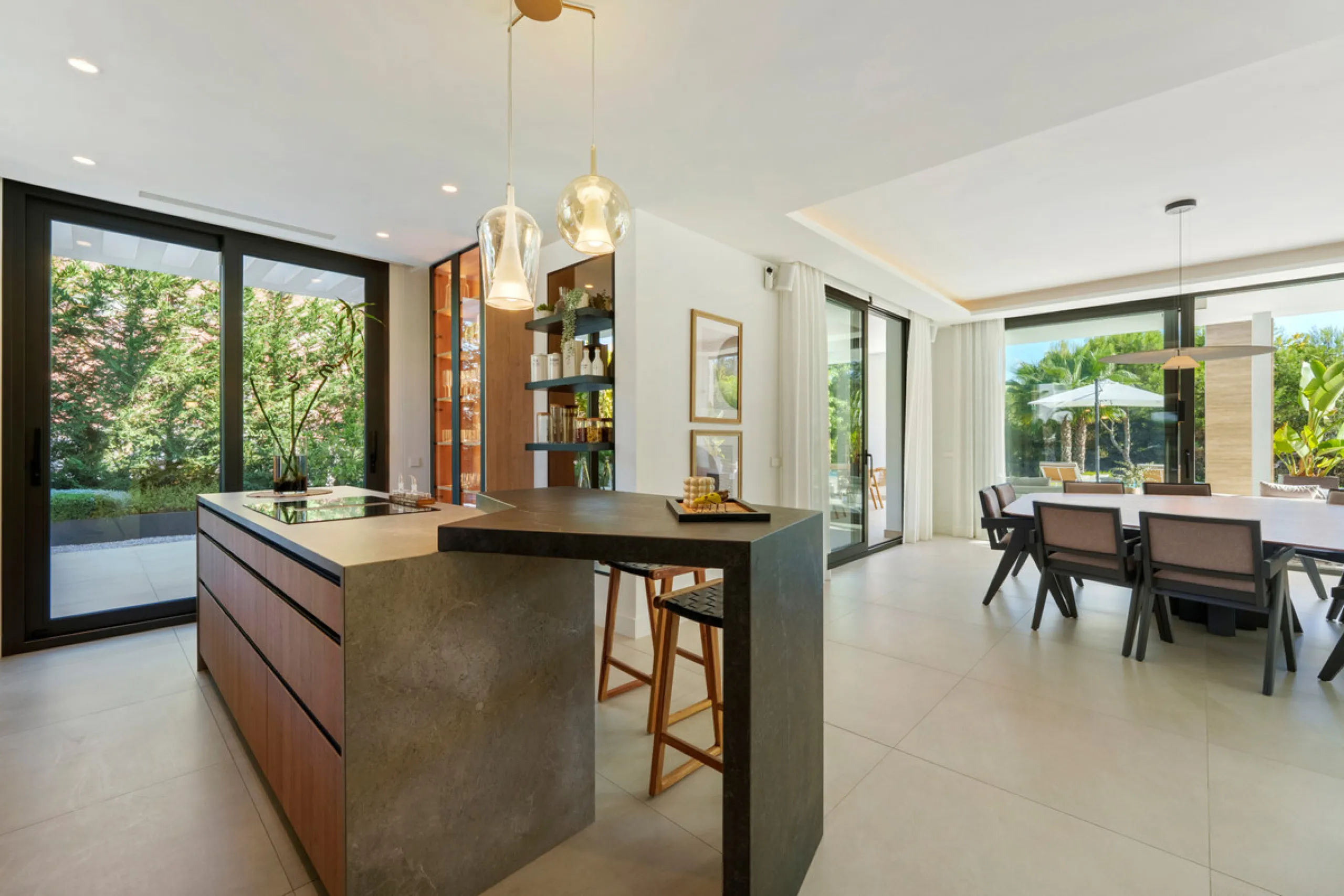 Nestled in the prestigious Altos de Puente Romano on Marbella's Golden Mile, Villa Romano is the epitome of modern Mediterranean luxury. This striking six-bedroom, six-bathroom residence blends sleek contemporary architecture with warm natural tones, crea