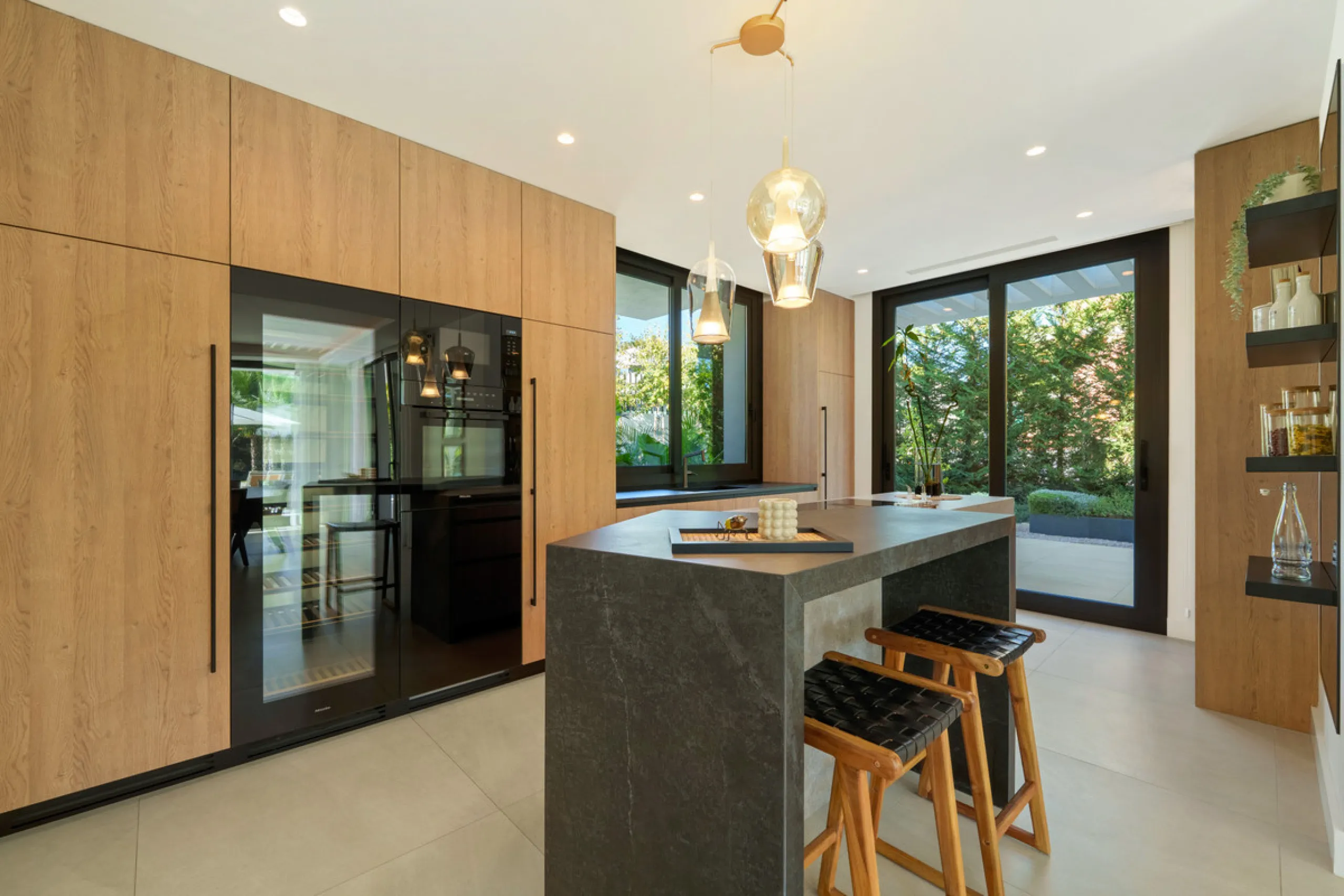 Nestled in the prestigious Altos de Puente Romano on Marbella's Golden Mile, Villa Romano is the epitome of modern Mediterranean luxury. This striking six-bedroom, six-bathroom residence blends sleek contemporary architecture with warm natural tones, crea