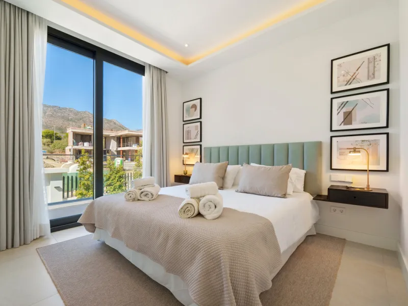 Nestled in the prestigious Altos de Puente Romano on Marbella's Golden Mile, Villa Romano is the epitome of modern Mediterranean luxury. This striking six-bedroom, six-bathroom residence blends sleek contemporary architecture with warm natural tones, crea