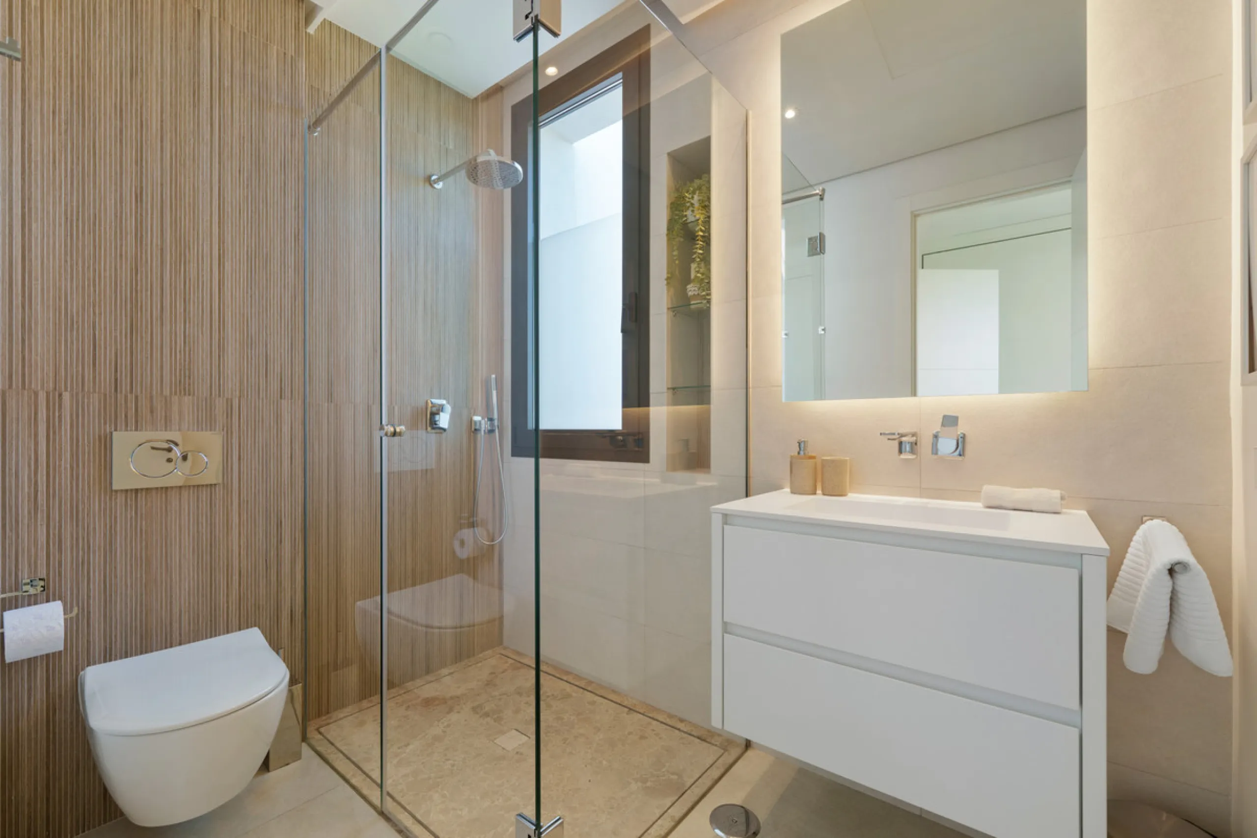 Nestled in the prestigious Altos de Puente Romano on Marbella's Golden Mile, Villa Romano is the epitome of modern Mediterranean luxury. This striking six-bedroom, six-bathroom residence blends sleek contemporary architecture with warm natural tones, crea