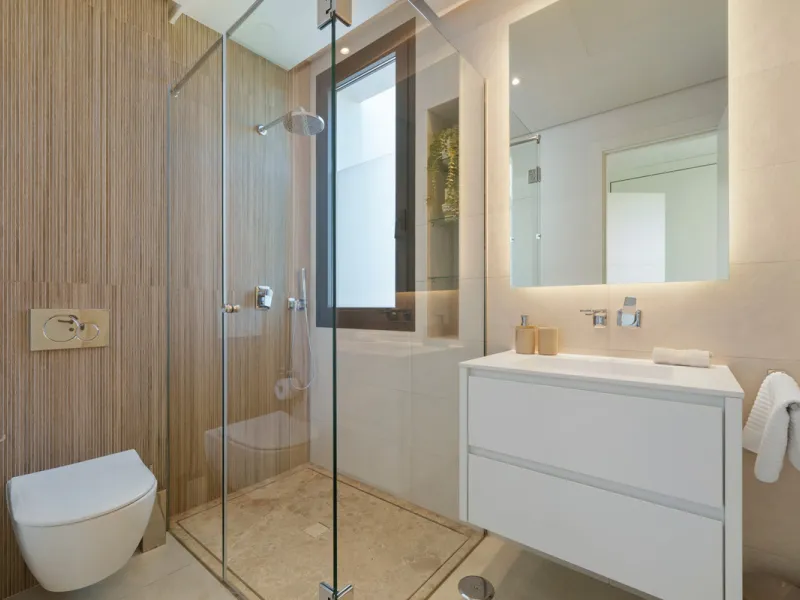 Nestled in the prestigious Altos de Puente Romano on Marbella's Golden Mile, Villa Romano is the epitome of modern Mediterranean luxury. This striking six-bedroom, six-bathroom residence blends sleek contemporary architecture with warm natural tones, crea