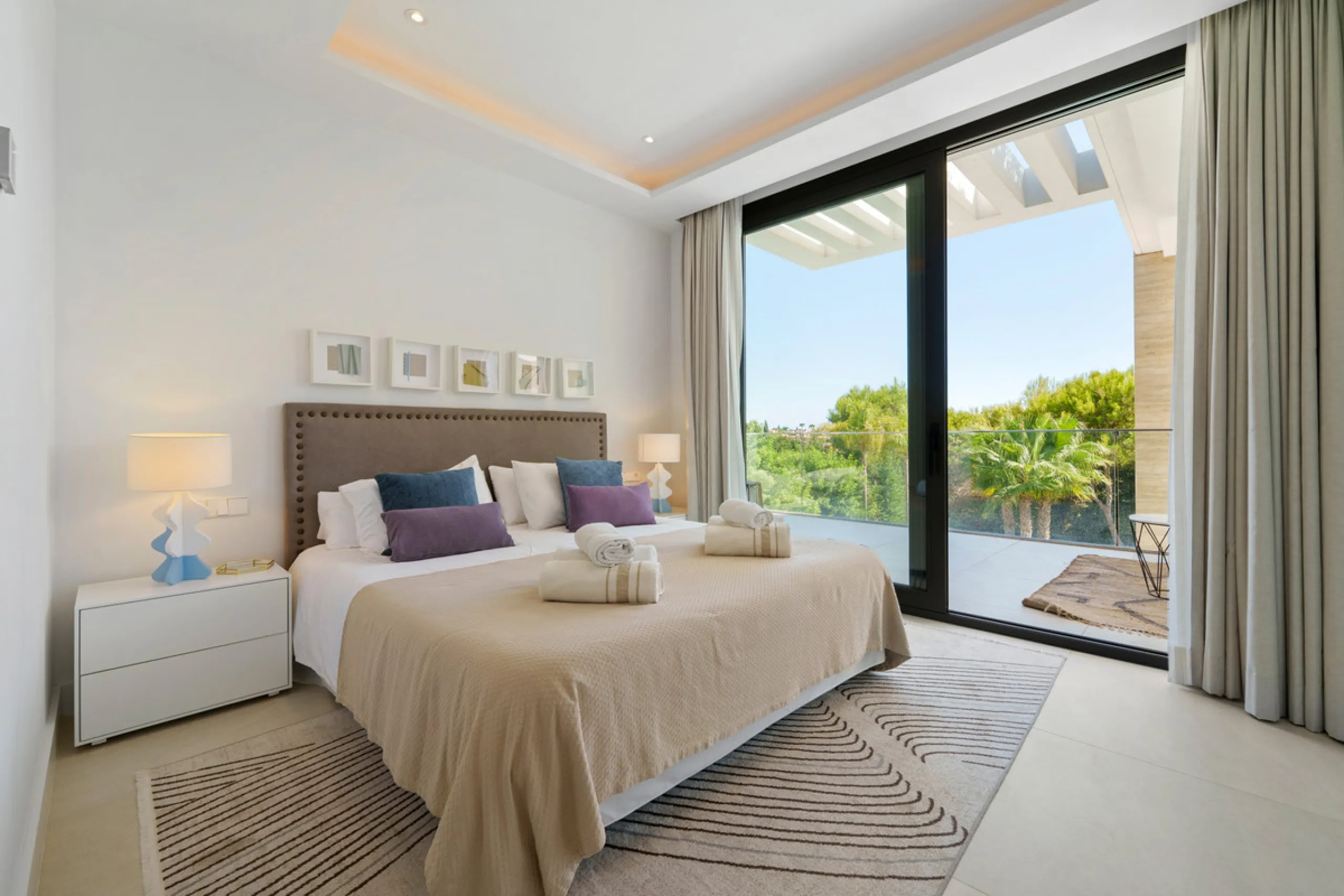 Nestled in the prestigious Altos de Puente Romano on Marbella's Golden Mile, Villa Romano is the epitome of modern Mediterranean luxury. This striking six-bedroom, six-bathroom residence blends sleek contemporary architecture with warm natural tones, crea