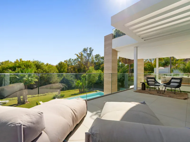 Nestled in the prestigious Altos de Puente Romano on Marbella's Golden Mile, Villa Romano is the epitome of modern Mediterranean luxury. This striking six-bedroom, six-bathroom residence blends sleek contemporary architecture with warm natural tones, crea