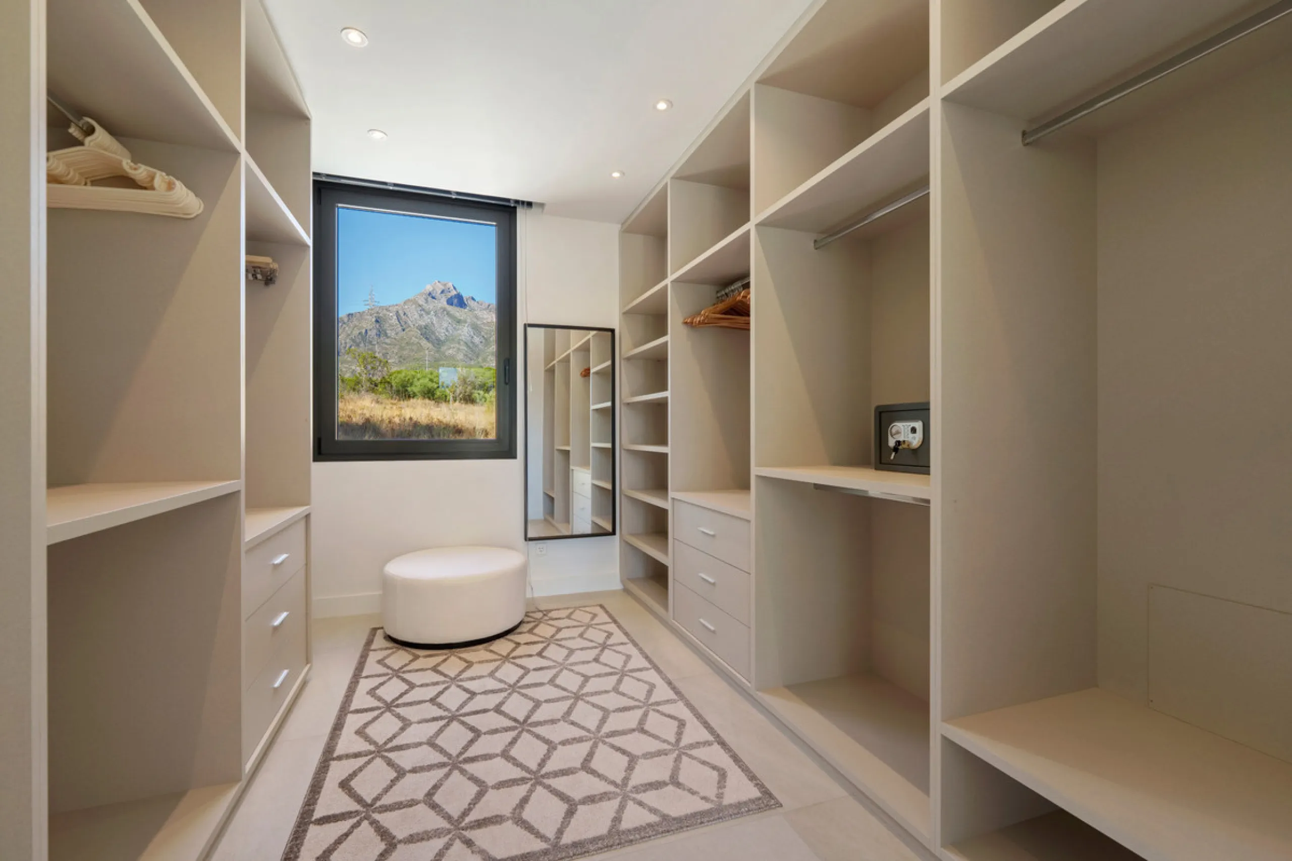 Nestled in the prestigious Altos de Puente Romano on Marbella's Golden Mile, Villa Romano is the epitome of modern Mediterranean luxury. This striking six-bedroom, six-bathroom residence blends sleek contemporary architecture with warm natural tones, crea