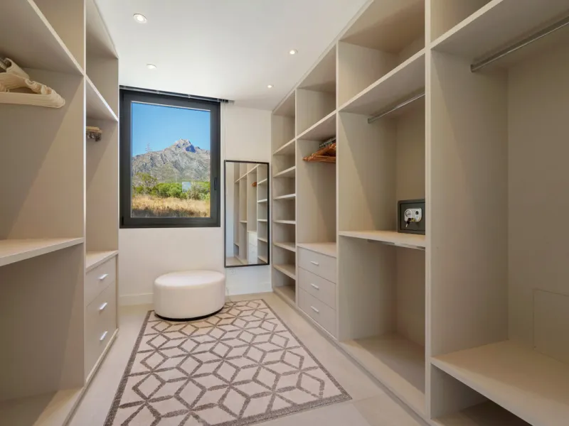 Nestled in the prestigious Altos de Puente Romano on Marbella's Golden Mile, Villa Romano is the epitome of modern Mediterranean luxury. This striking six-bedroom, six-bathroom residence blends sleek contemporary architecture with warm natural tones, crea