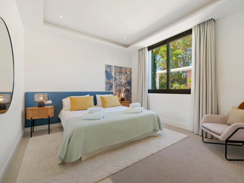 Nestled in the prestigious Altos de Puente Romano on Marbella's Golden Mile, Villa Romano is the epitome of modern Mediterranean luxury. This striking six-bedroom, six-bathroom residence blends sleek contemporary architecture with warm natural tones, crea
