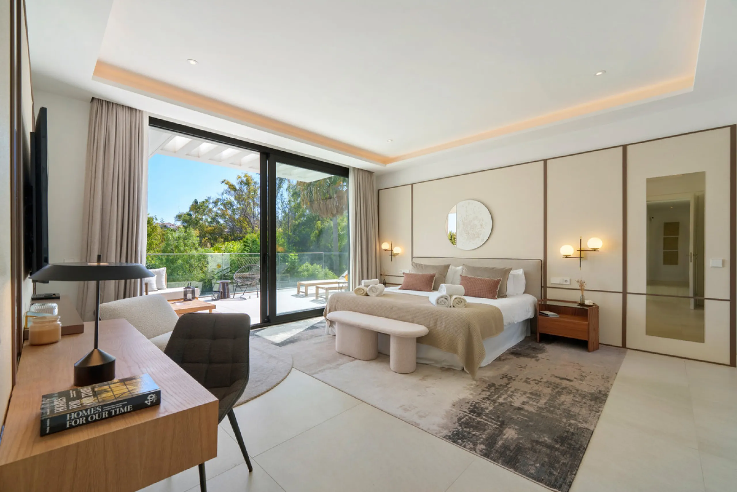 Nestled in the prestigious Altos de Puente Romano on Marbella's Golden Mile, Villa Romano is the epitome of modern Mediterranean luxury. This striking six-bedroom, six-bathroom residence blends sleek contemporary architecture with warm natural tones, crea