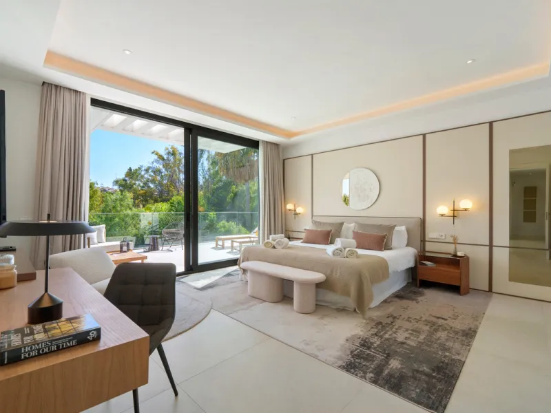 Nestled in the prestigious Altos de Puente Romano on Marbella's Golden Mile, Villa Romano is the epitome of modern Mediterranean luxury. This striking six-bedroom, six-bathroom residence blends sleek contemporary architecture with warm natural tones, crea