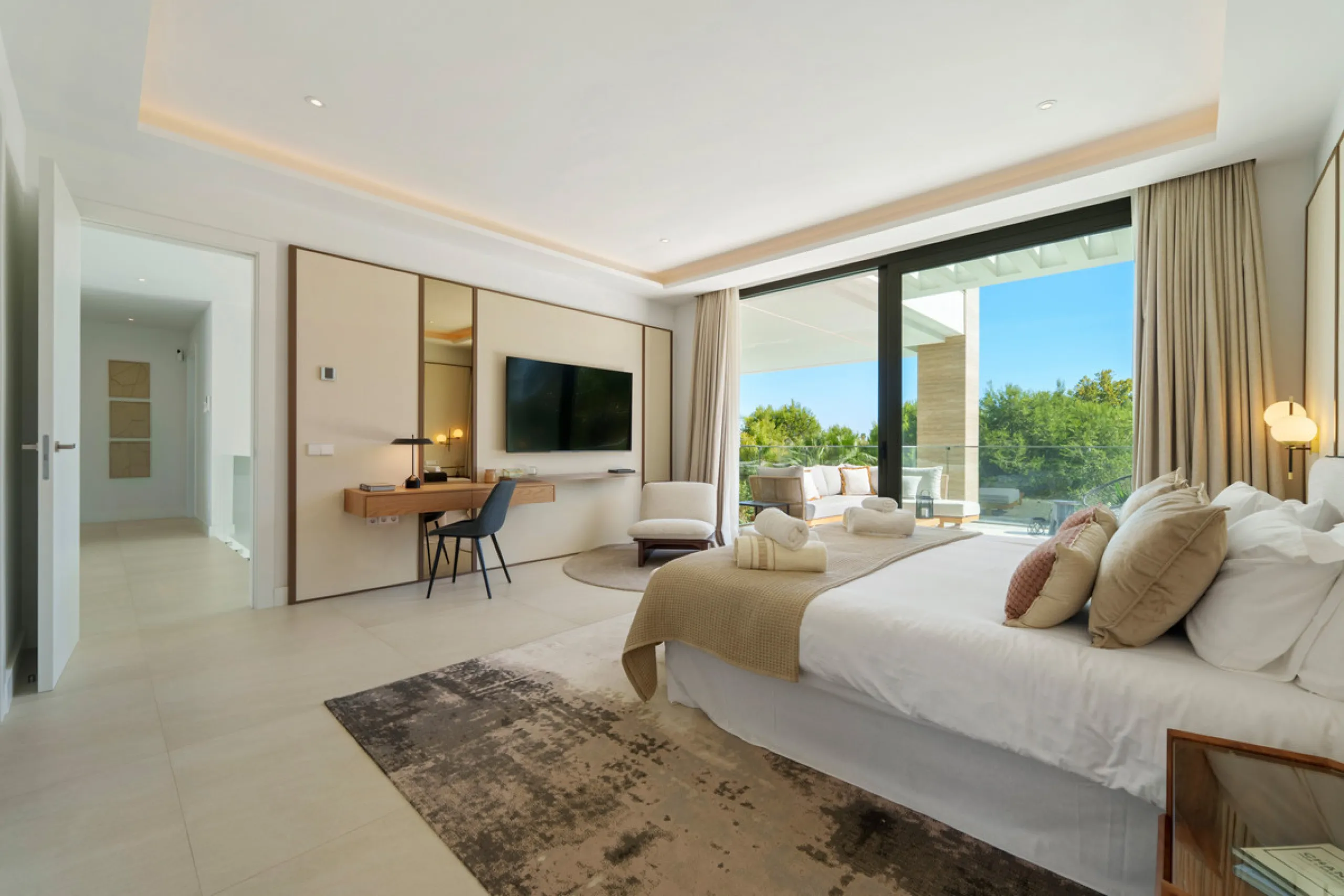 Nestled in the prestigious Altos de Puente Romano on Marbella's Golden Mile, Villa Romano is the epitome of modern Mediterranean luxury. This striking six-bedroom, six-bathroom residence blends sleek contemporary architecture with warm natural tones, crea