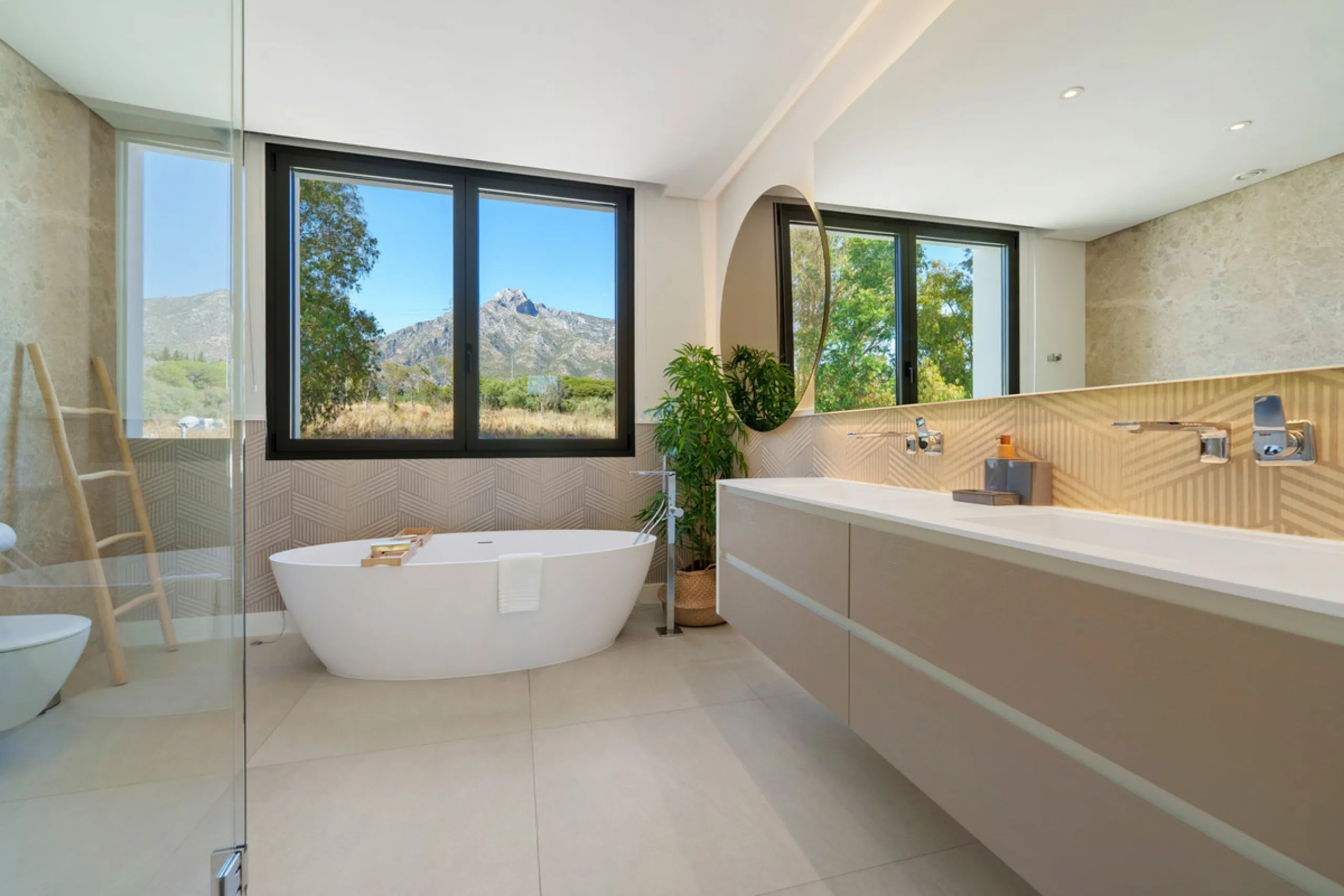 Nestled in the prestigious Altos de Puente Romano on Marbella's Golden Mile, Villa Romano is the epitome of modern Mediterranean luxury. This striking six-bedroom, six-bathroom residence blends sleek contemporary architecture with warm natural tones, crea
