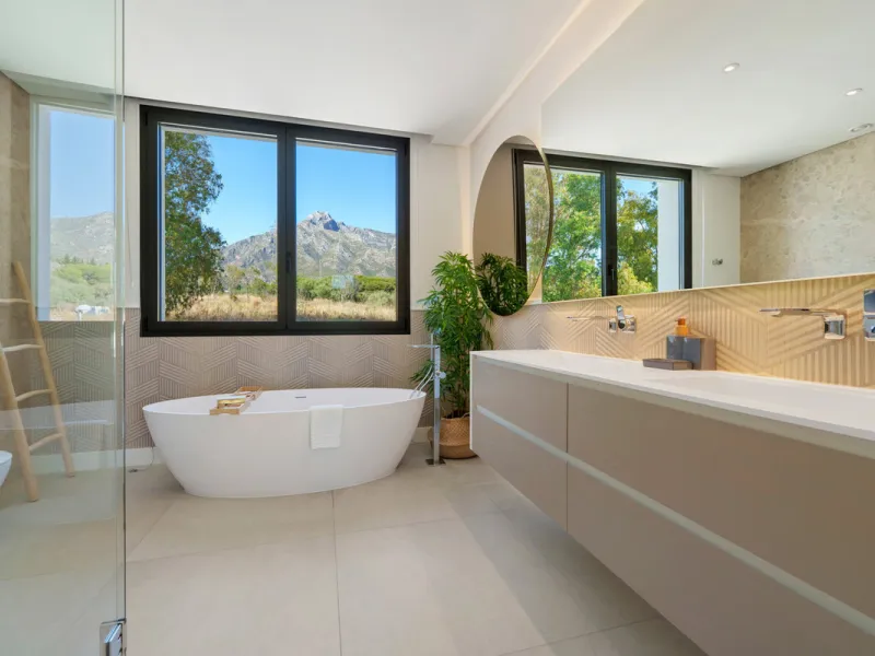 Nestled in the prestigious Altos de Puente Romano on Marbella's Golden Mile, Villa Romano is the epitome of modern Mediterranean luxury. This striking six-bedroom, six-bathroom residence blends sleek contemporary architecture with warm natural tones, crea