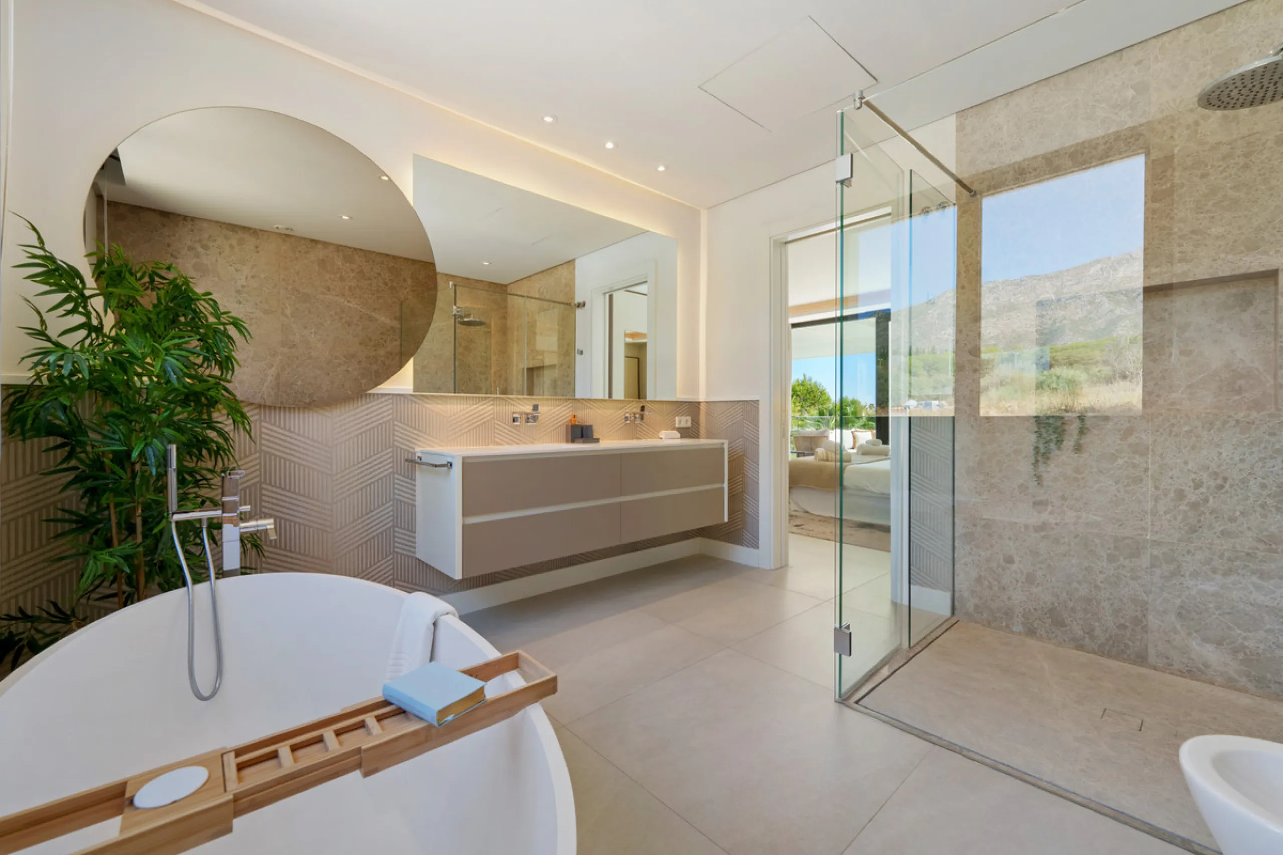 Nestled in the prestigious Altos de Puente Romano on Marbella's Golden Mile, Villa Romano is the epitome of modern Mediterranean luxury. This striking six-bedroom, six-bathroom residence blends sleek contemporary architecture with warm natural tones, crea