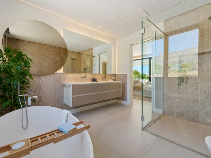 Nestled in the prestigious Altos de Puente Romano on Marbella's Golden Mile, Villa Romano is the epitome of modern Mediterranean luxury. This striking six-bedroom, six-bathroom residence blends sleek contemporary architecture with warm natural tones, crea
