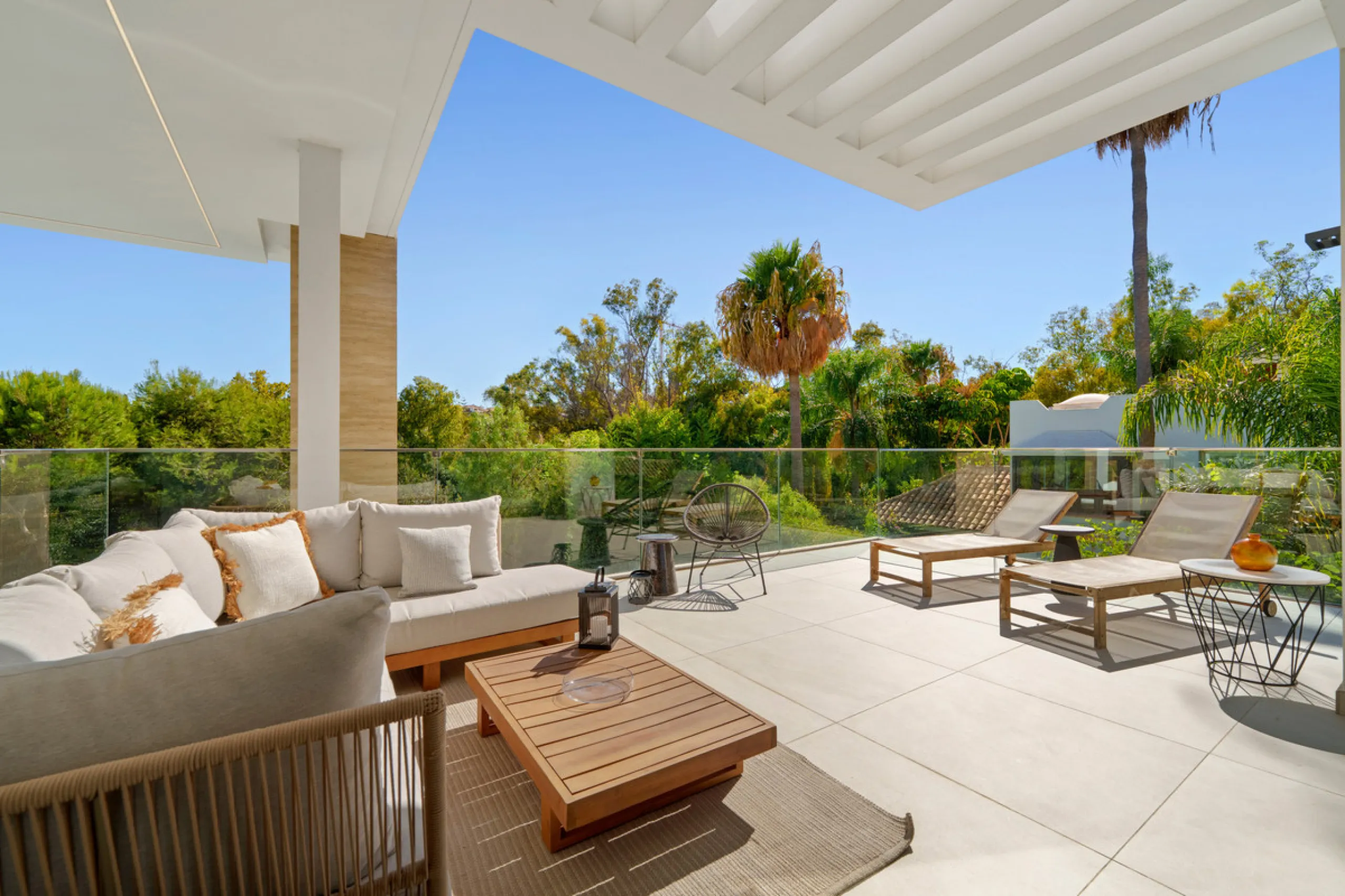 Nestled in the prestigious Altos de Puente Romano on Marbella's Golden Mile, Villa Romano is the epitome of modern Mediterranean luxury. This striking six-bedroom, six-bathroom residence blends sleek contemporary architecture with warm natural tones, crea
