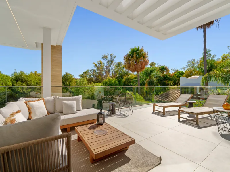 Nestled in the prestigious Altos de Puente Romano on Marbella's Golden Mile, Villa Romano is the epitome of modern Mediterranean luxury. This striking six-bedroom, six-bathroom residence blends sleek contemporary architecture with warm natural tones, crea