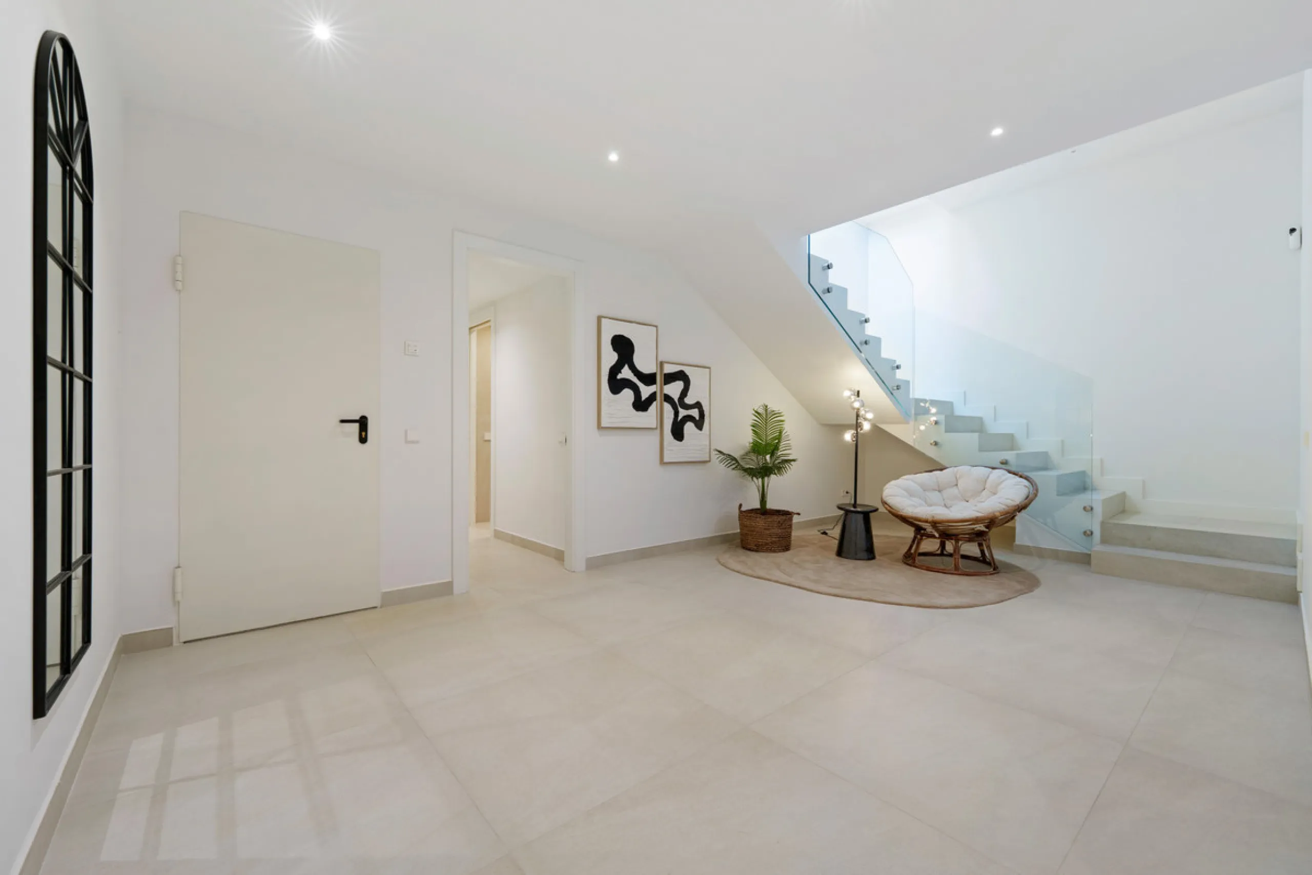Nestled in the prestigious Altos de Puente Romano on Marbella's Golden Mile, Villa Romano is the epitome of modern Mediterranean luxury. This striking six-bedroom, six-bathroom residence blends sleek contemporary architecture with warm natural tones, crea