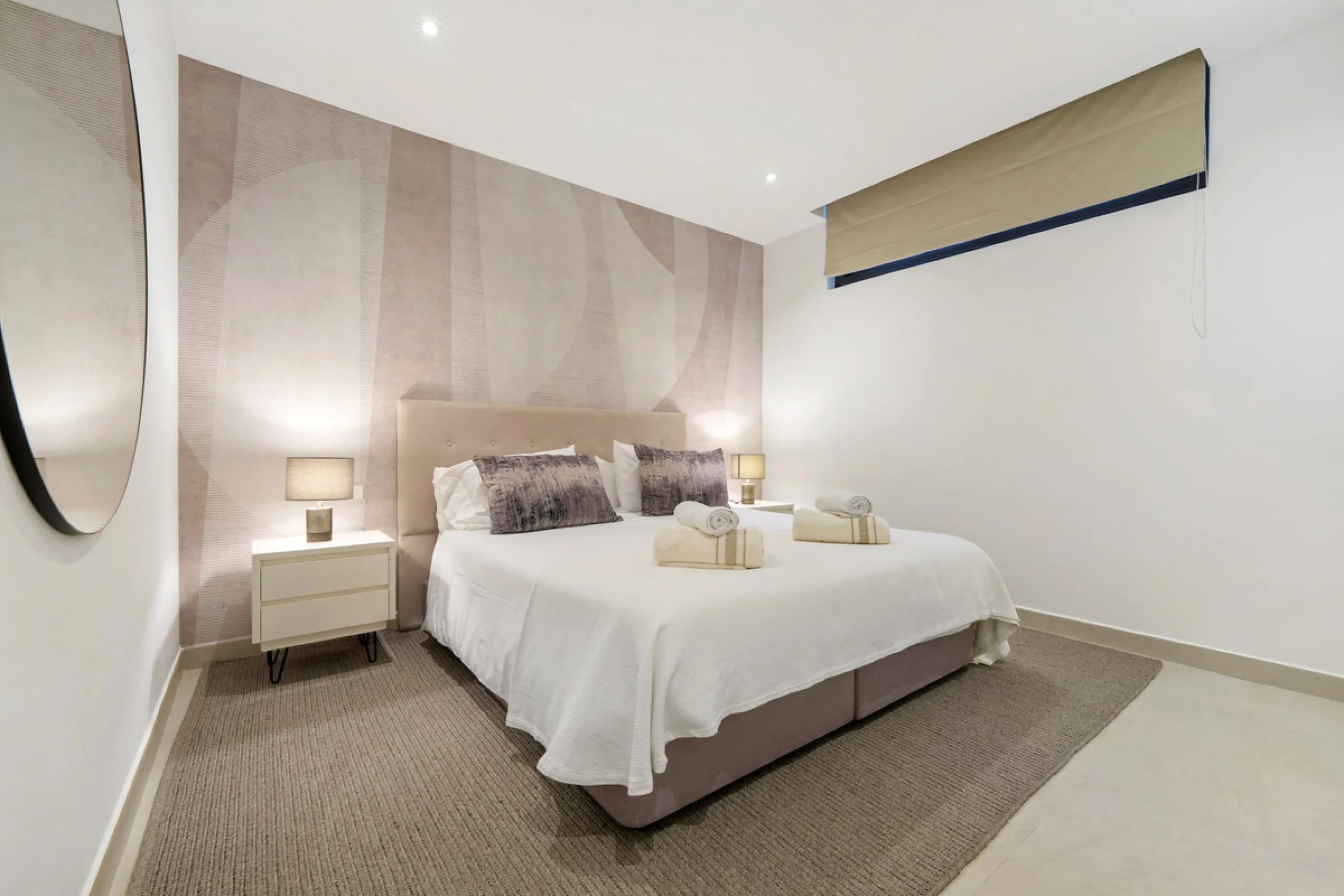 Nestled in the prestigious Altos de Puente Romano on Marbella's Golden Mile, Villa Romano is the epitome of modern Mediterranean luxury. This striking six-bedroom, six-bathroom residence blends sleek contemporary architecture with warm natural tones, crea