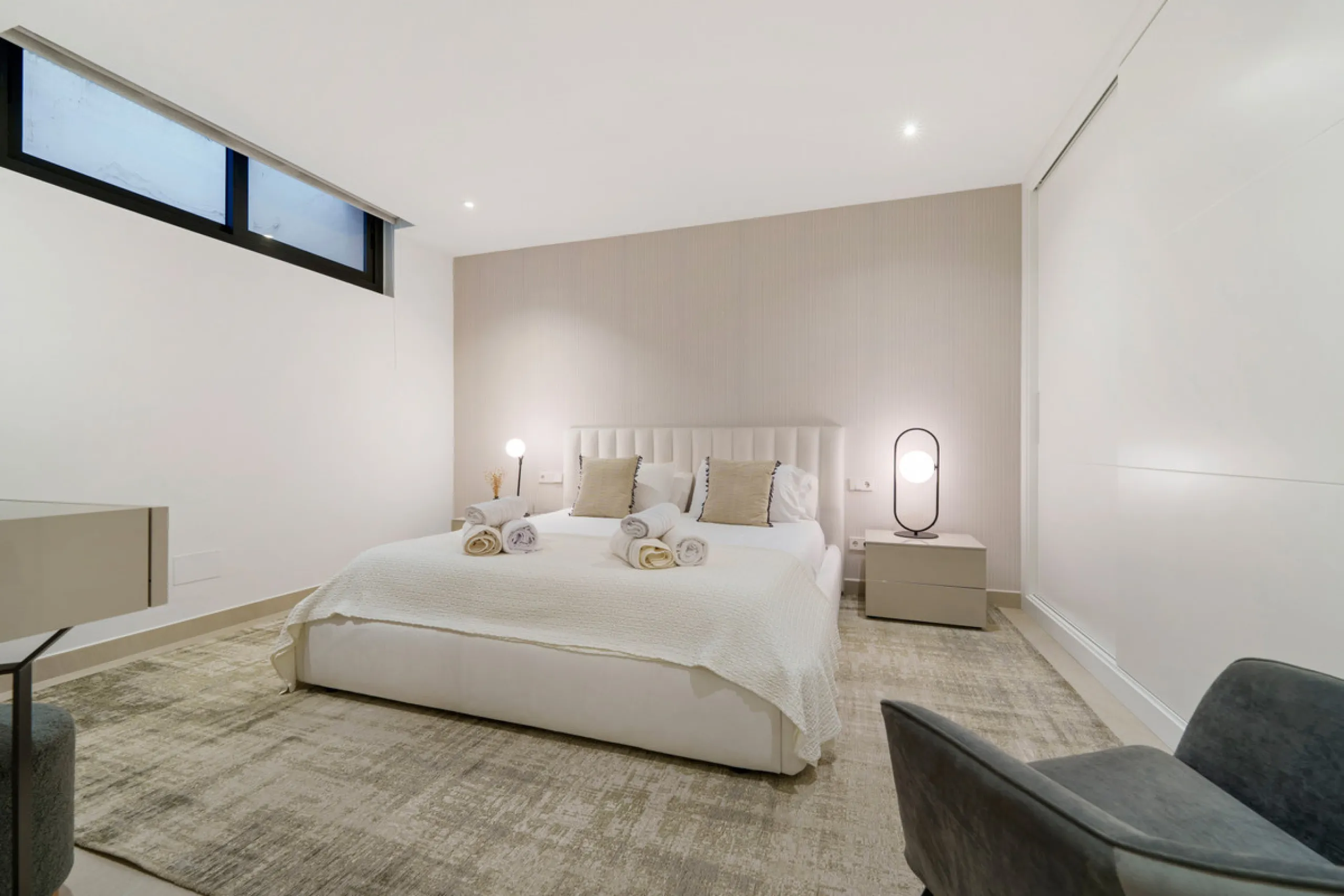 Nestled in the prestigious Altos de Puente Romano on Marbella's Golden Mile, Villa Romano is the epitome of modern Mediterranean luxury. This striking six-bedroom, six-bathroom residence blends sleek contemporary architecture with warm natural tones, crea