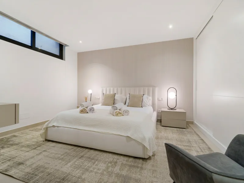 Nestled in the prestigious Altos de Puente Romano on Marbella's Golden Mile, Villa Romano is the epitome of modern Mediterranean luxury. This striking six-bedroom, six-bathroom residence blends sleek contemporary architecture with warm natural tones, crea