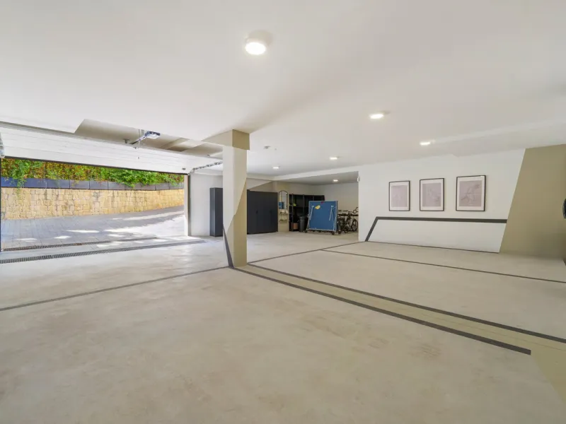 Nestled in the prestigious Altos de Puente Romano on Marbella's Golden Mile, Villa Romano is the epitome of modern Mediterranean luxury. This striking six-bedroom, six-bathroom residence blends sleek contemporary architecture with warm natural tones, crea