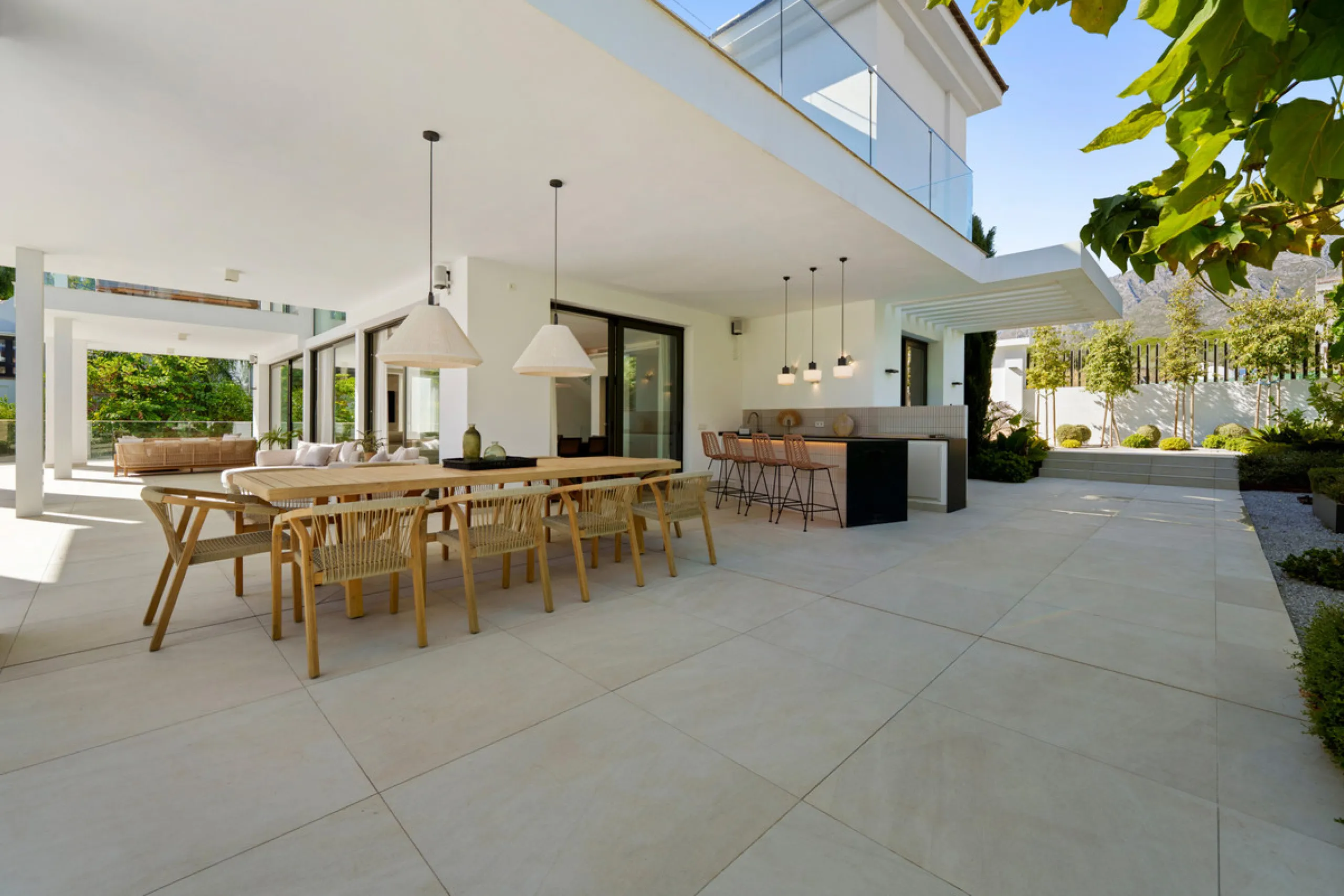 Nestled in the prestigious Altos de Puente Romano on Marbella's Golden Mile, Villa Romano is the epitome of modern Mediterranean luxury. This striking six-bedroom, six-bathroom residence blends sleek contemporary architecture with warm natural tones, crea