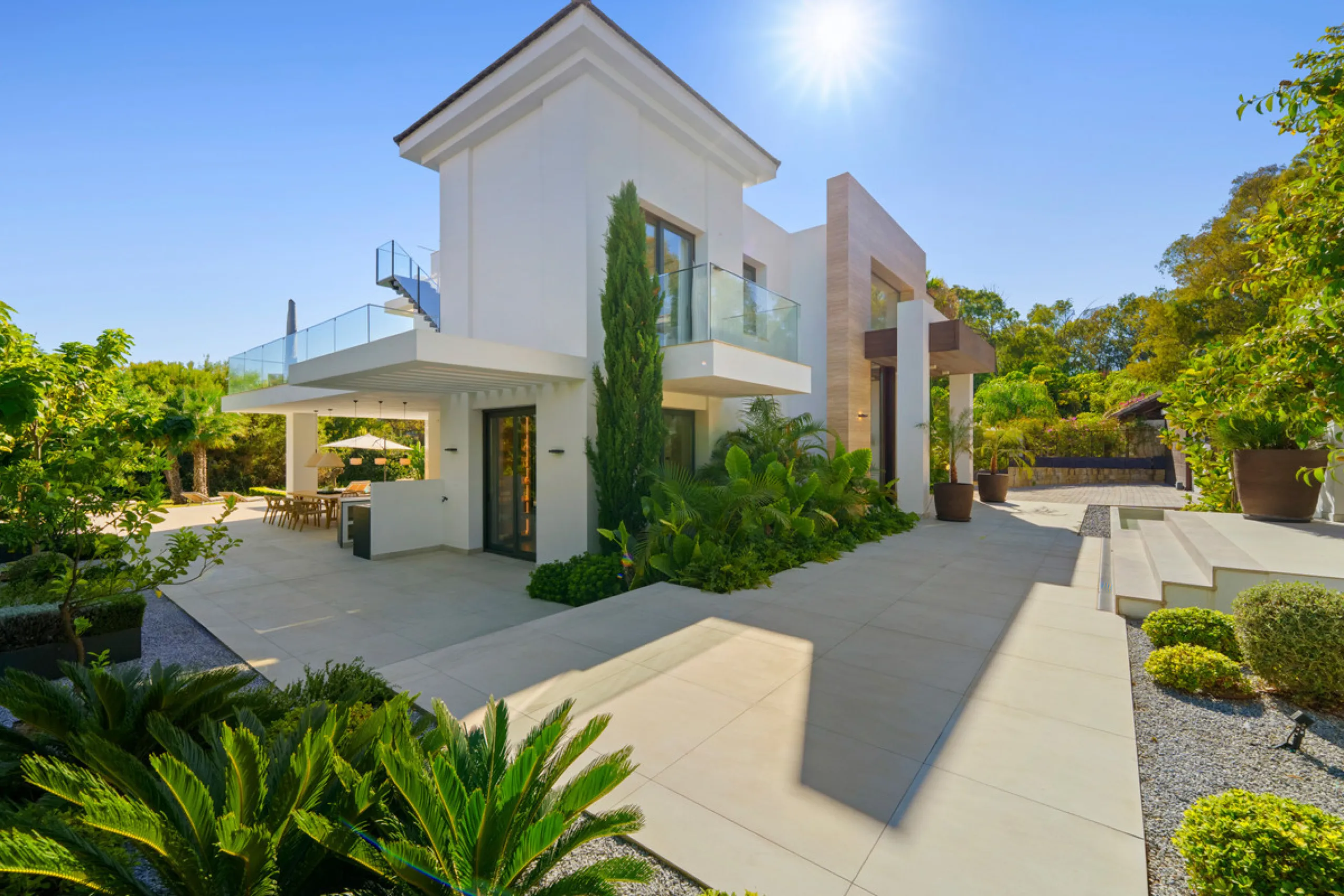 Nestled in the prestigious Altos de Puente Romano on Marbella's Golden Mile, Villa Romano is the epitome of modern Mediterranean luxury. This striking six-bedroom, six-bathroom residence blends sleek contemporary architecture with warm natural tones, crea