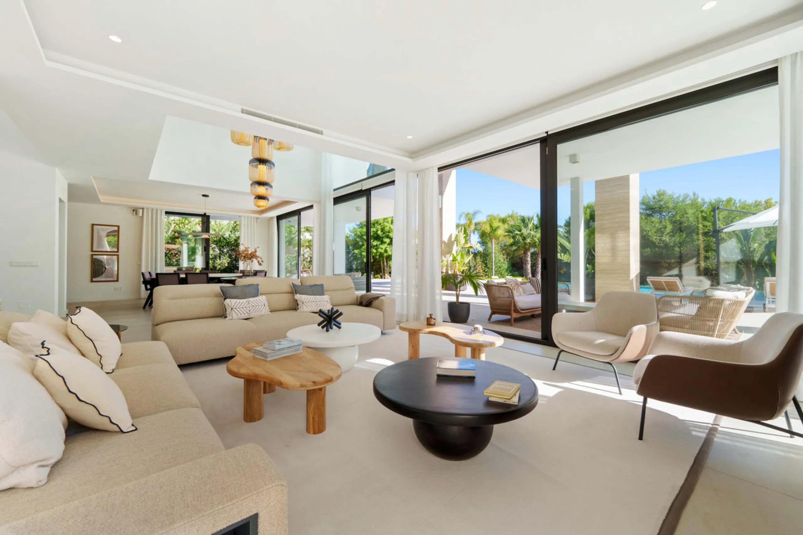 Nestled in the prestigious Altos de Puente Romano on Marbella's Golden Mile, Villa Romano is the epitome of modern Mediterranean luxury. This striking six-bedroom, six-bathroom residence blends sleek contemporary architecture with warm natural tones, crea