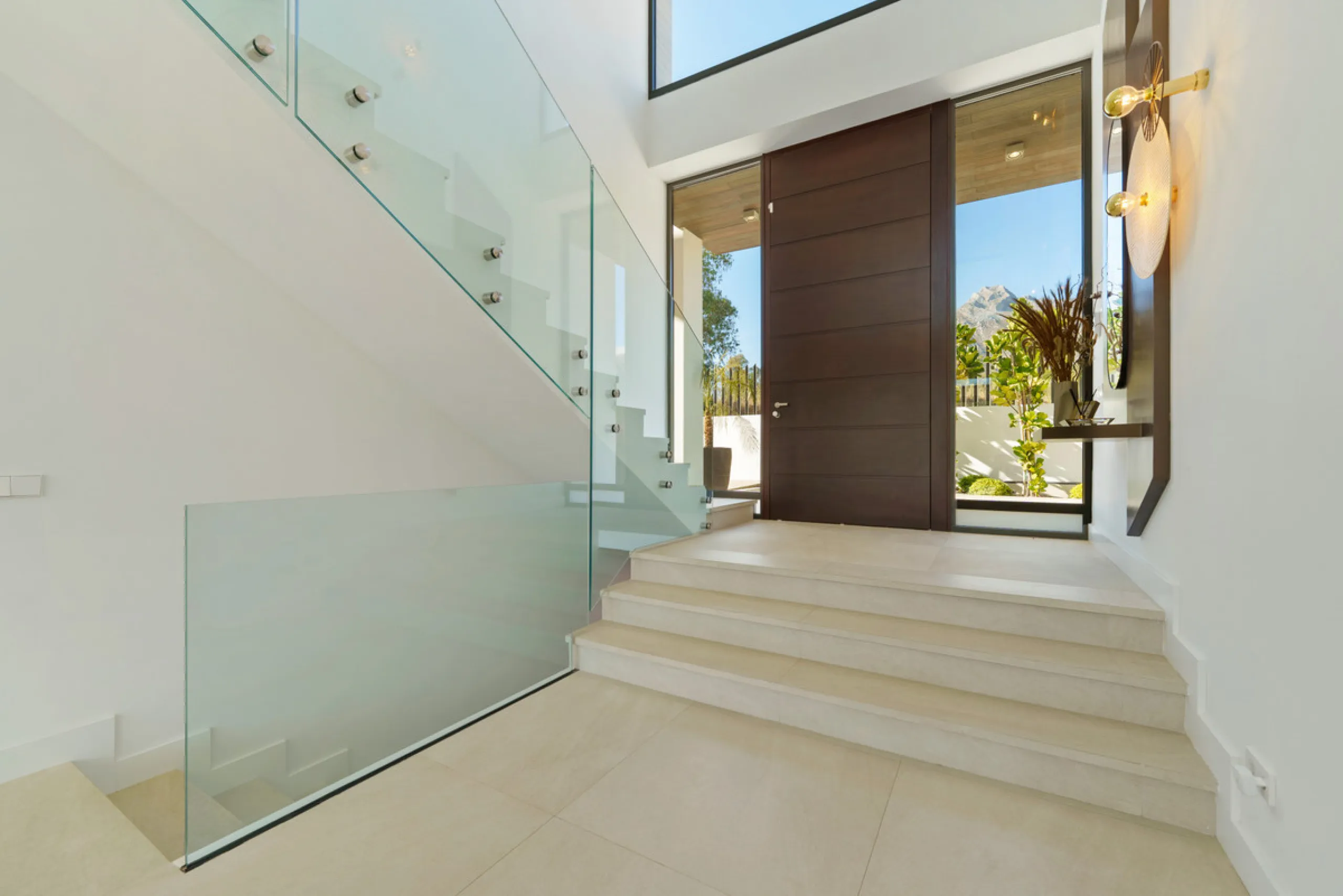Nestled in the prestigious Altos de Puente Romano on Marbella's Golden Mile, Villa Romano is the epitome of modern Mediterranean luxury. This striking six-bedroom, six-bathroom residence blends sleek contemporary architecture with warm natural tones, crea