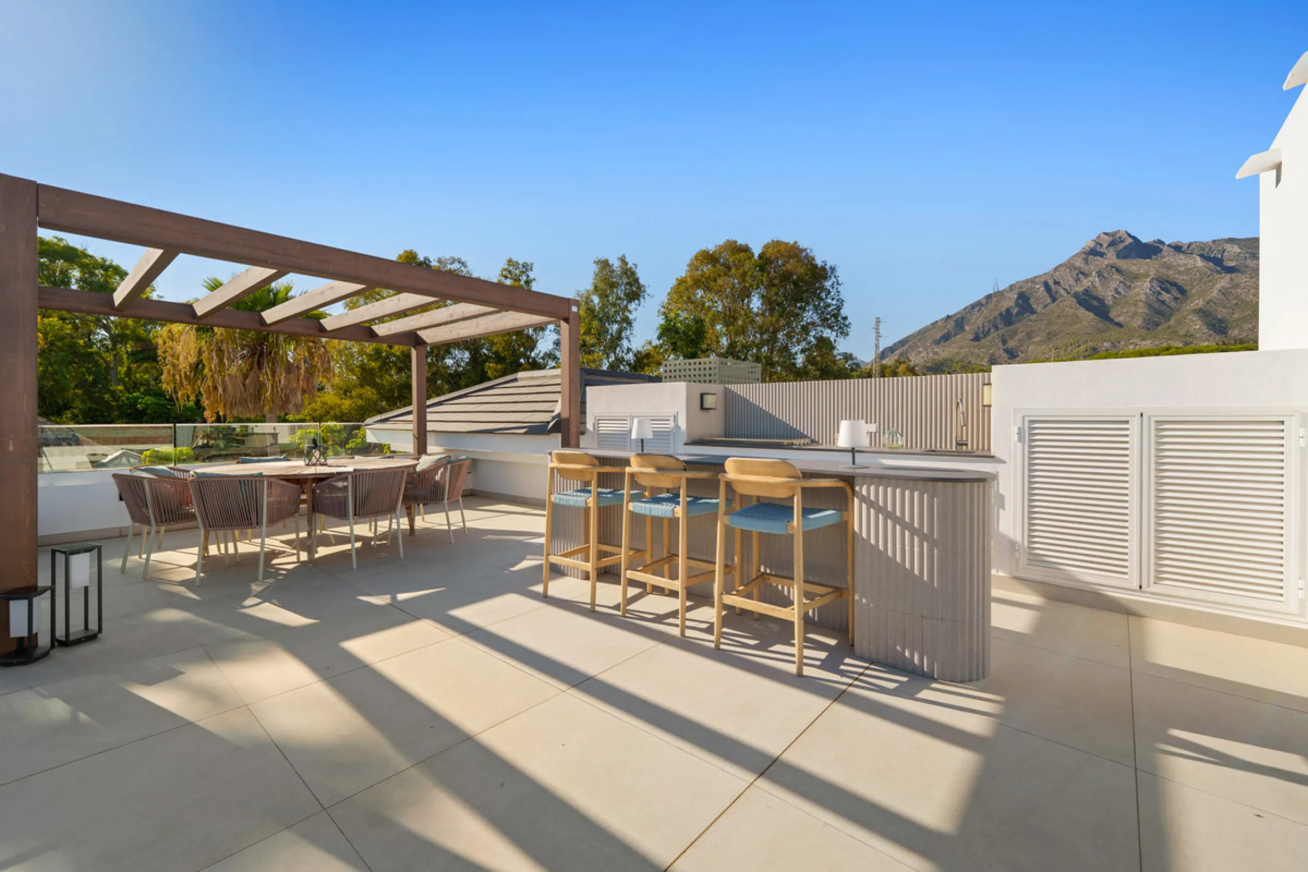 Nestled in the prestigious Altos de Puente Romano on Marbella's Golden Mile, Villa Romano is the epitome of modern Mediterranean luxury. This striking six-bedroom, six-bathroom residence blends sleek contemporary architecture with warm natural tones, crea