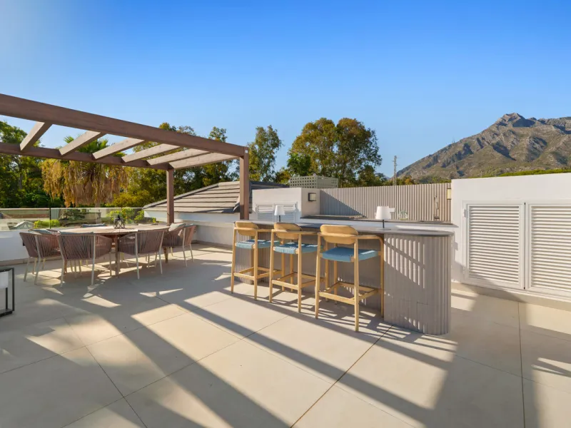 Nestled in the prestigious Altos de Puente Romano on Marbella's Golden Mile, Villa Romano is the epitome of modern Mediterranean luxury. This striking six-bedroom, six-bathroom residence blends sleek contemporary architecture with warm natural tones, crea