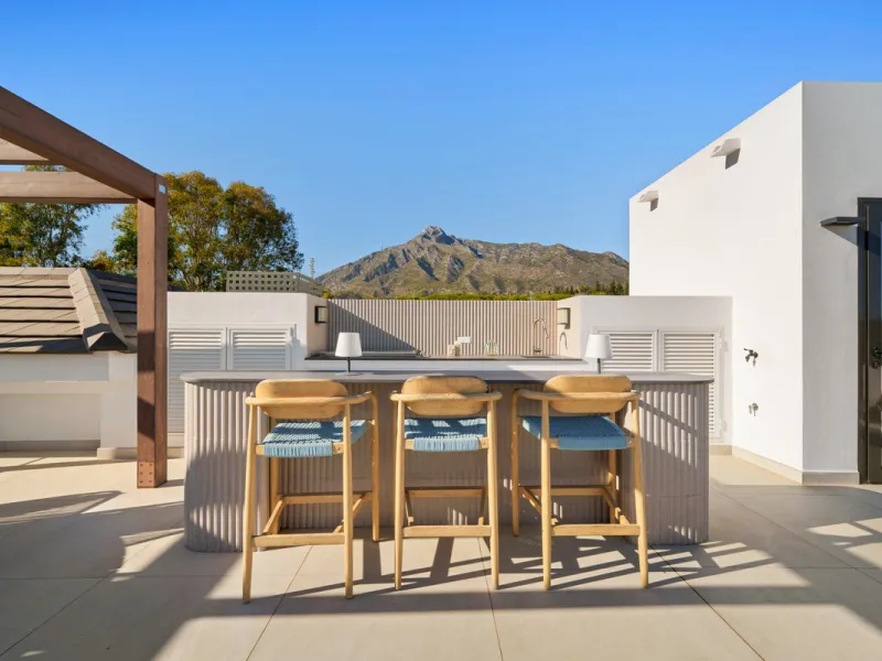 Nestled in the prestigious Altos de Puente Romano on Marbella's Golden Mile, Villa Romano is the epitome of modern Mediterranean luxury. This striking six-bedroom, six-bathroom residence blends sleek contemporary architecture with warm natural tones, crea