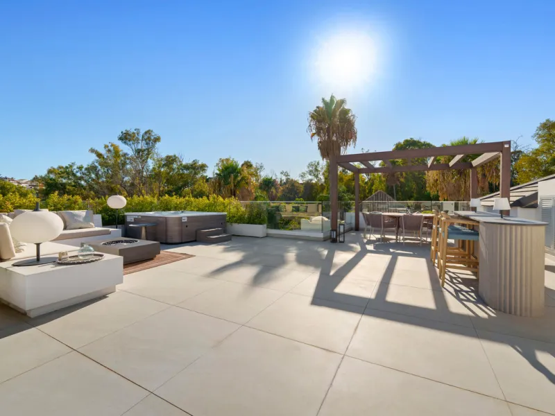 Nestled in the prestigious Altos de Puente Romano on Marbella's Golden Mile, Villa Romano is the epitome of modern Mediterranean luxury. This striking six-bedroom, six-bathroom residence blends sleek contemporary architecture with warm natural tones, crea
