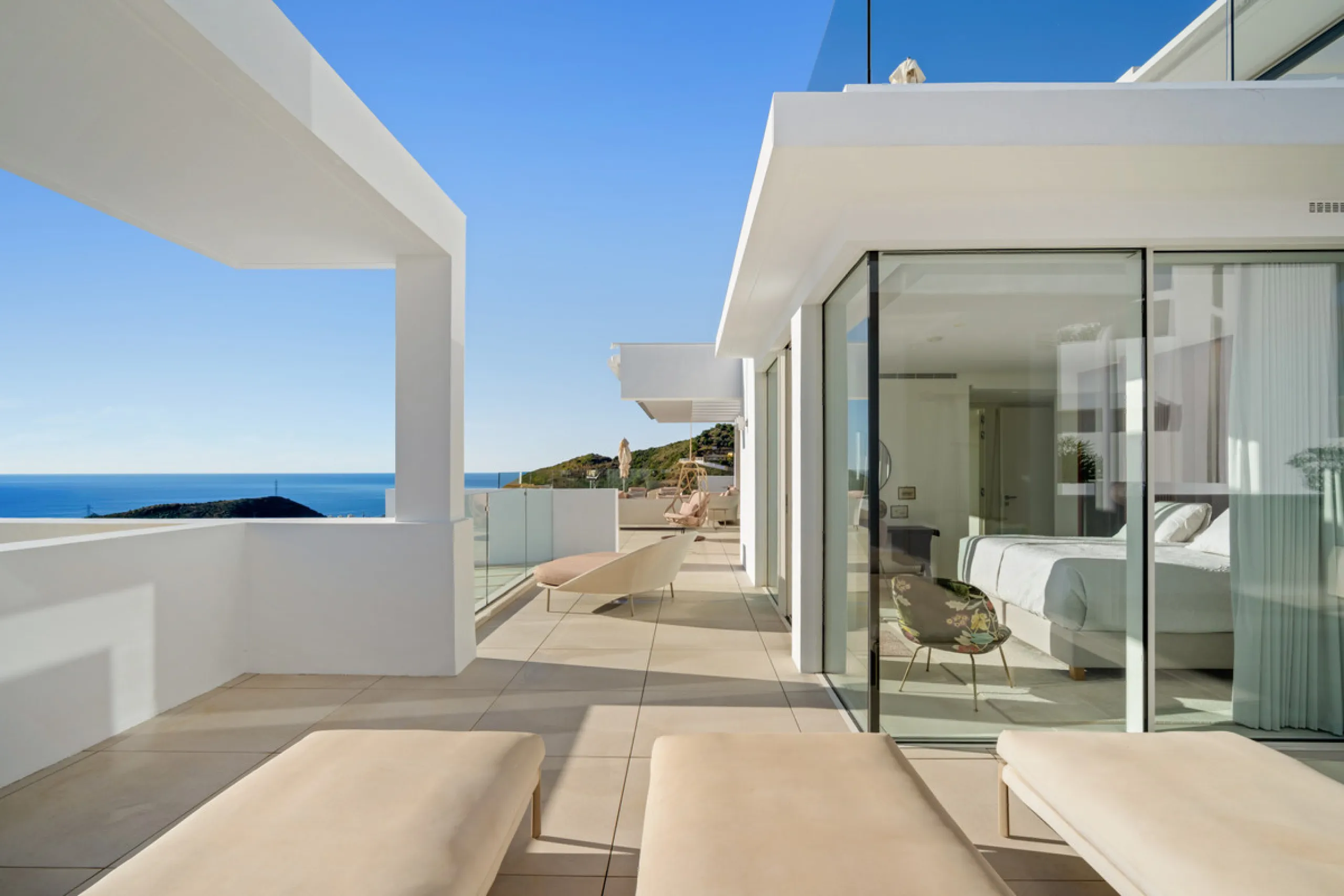 This exceptional duplex penthouse occupies one of the best positions within the exclusive Palo Alto community in Ojén, offering unobstructed panoramic sea views across the Mediterranean coastline.