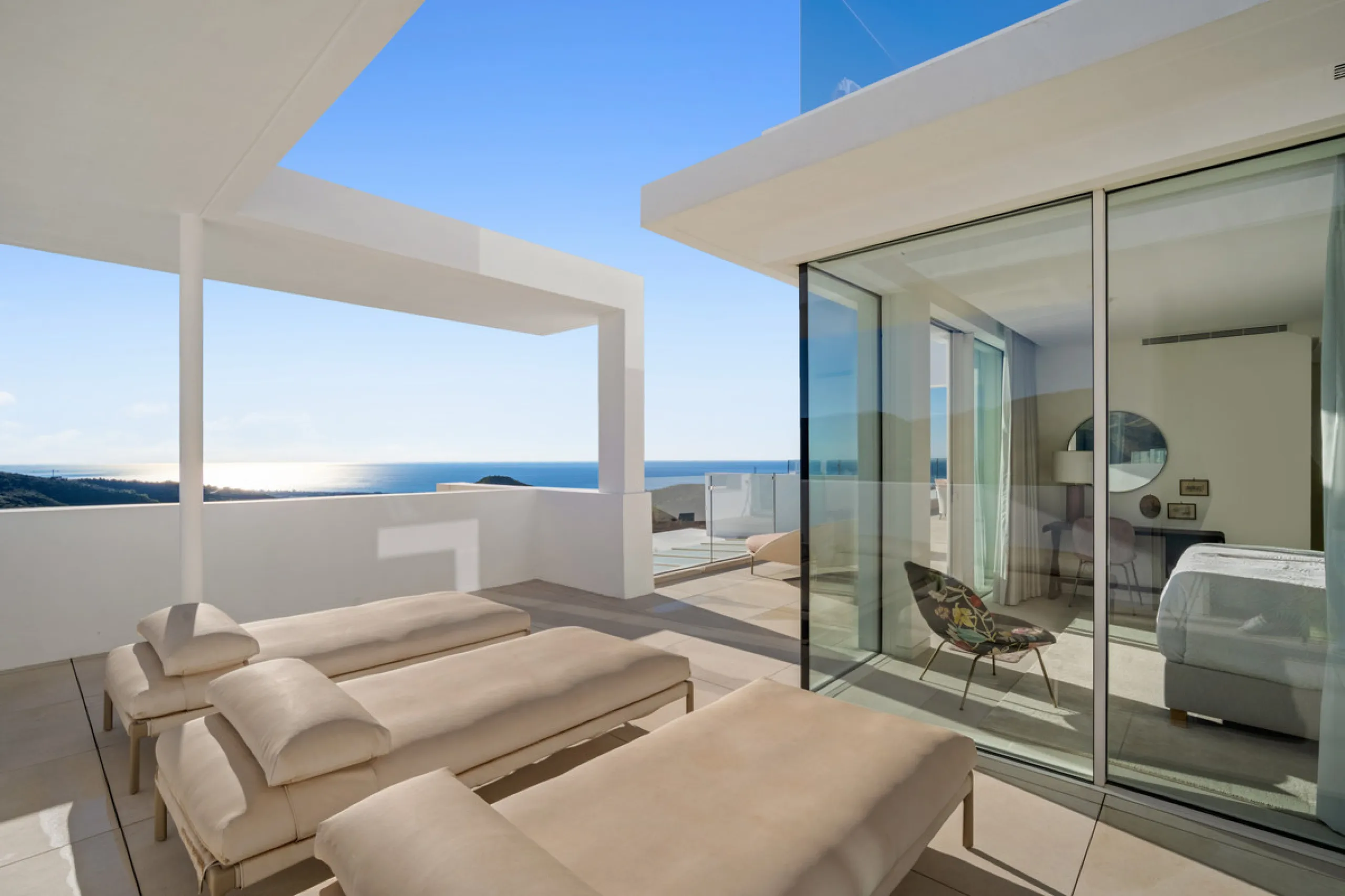 This exceptional duplex penthouse occupies one of the best positions within the exclusive Palo Alto community in Ojén, offering unobstructed panoramic sea views across the Mediterranean coastline.