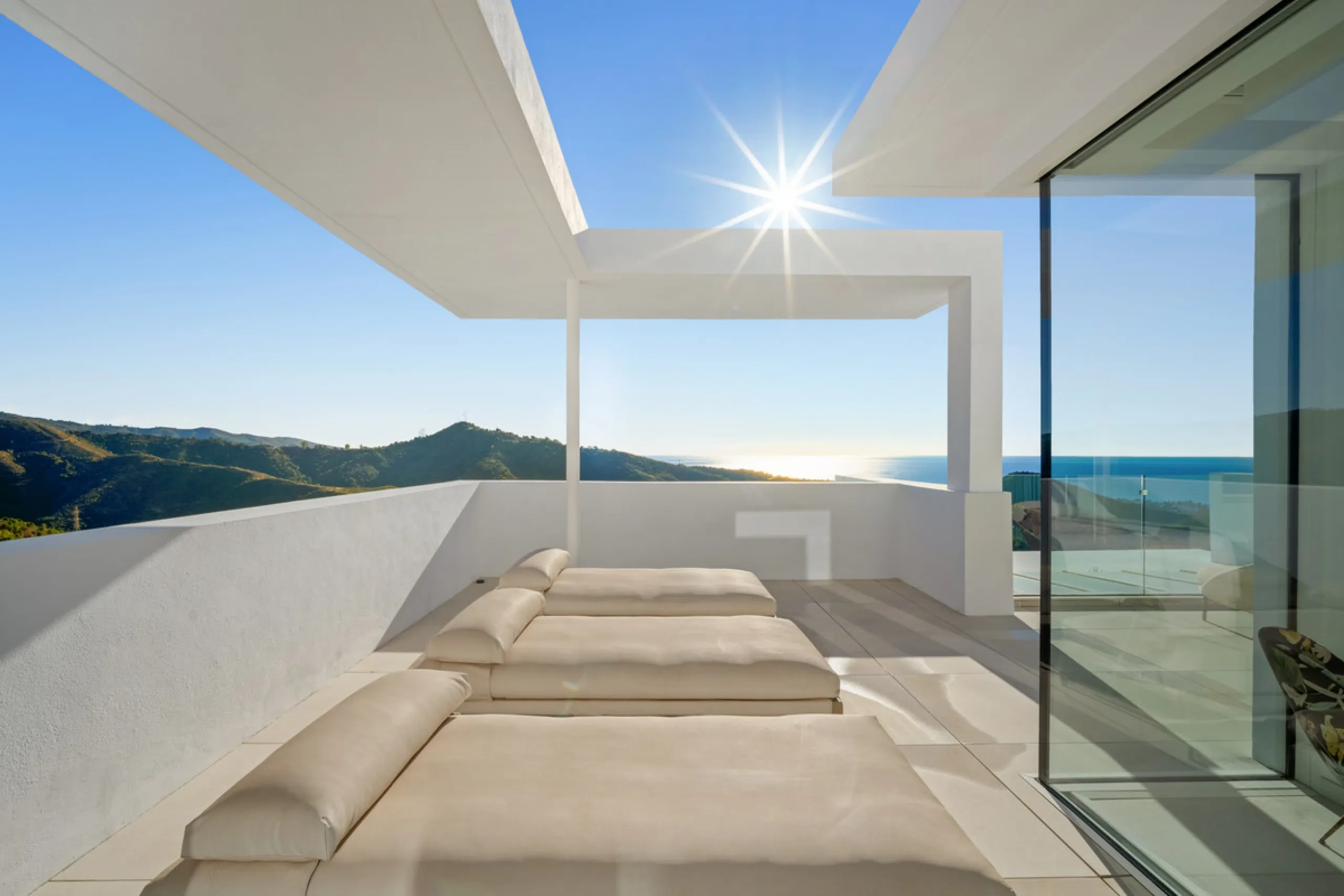 This exceptional duplex penthouse occupies one of the best positions within the exclusive Palo Alto community in Ojén, offering unobstructed panoramic sea views across the Mediterranean coastline.