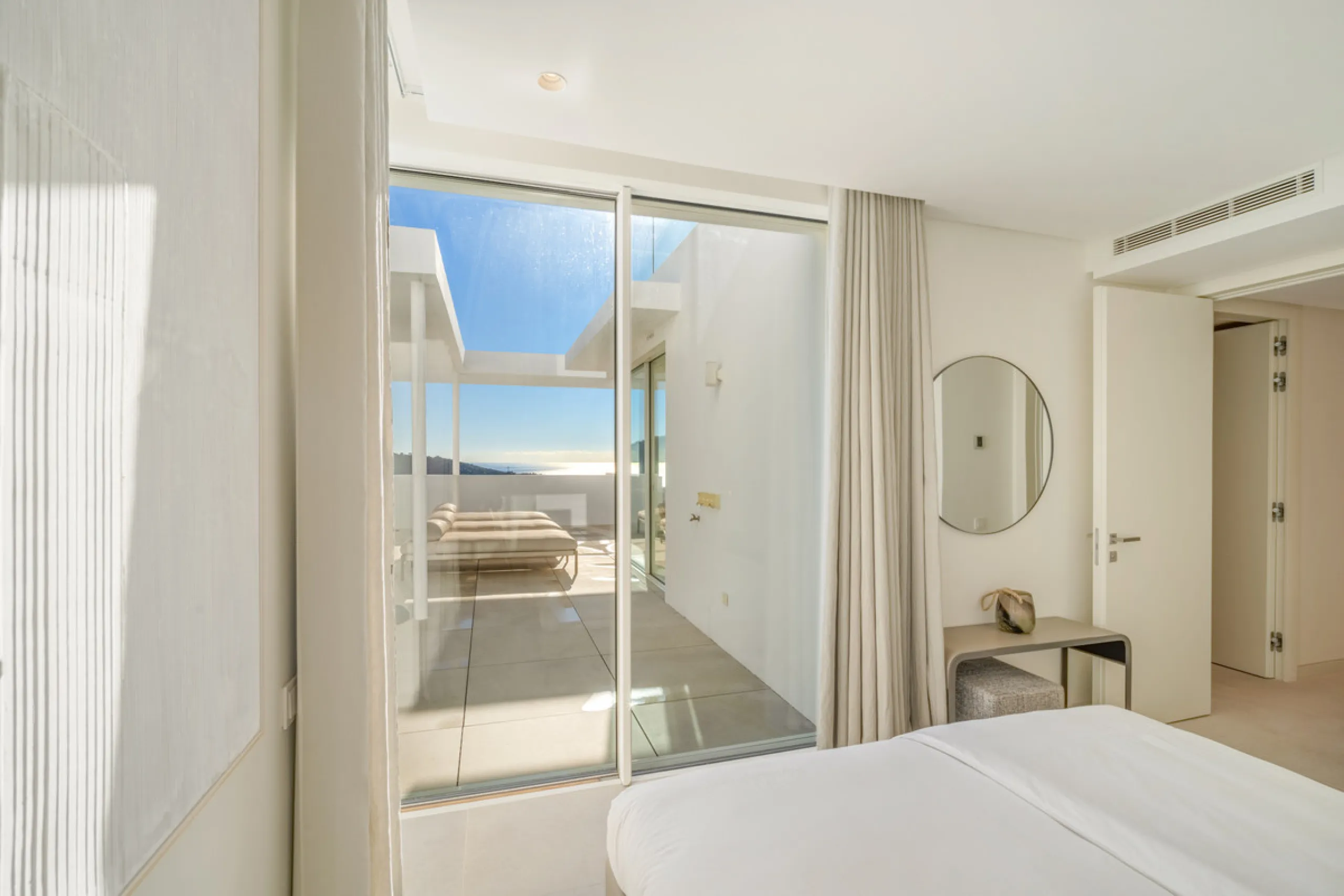 This exceptional duplex penthouse occupies one of the best positions within the exclusive Palo Alto community in Ojén, offering unobstructed panoramic sea views across the Mediterranean coastline.