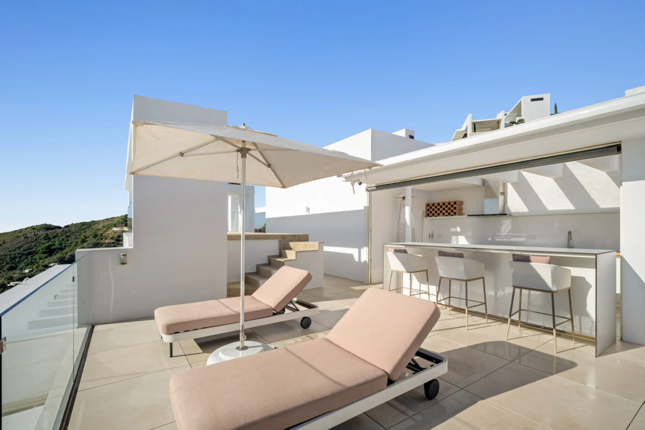 This exceptional duplex penthouse occupies one of the best positions within the exclusive Palo Alto community in Ojén, offering unobstructed panoramic sea views across the Mediterranean coastline.