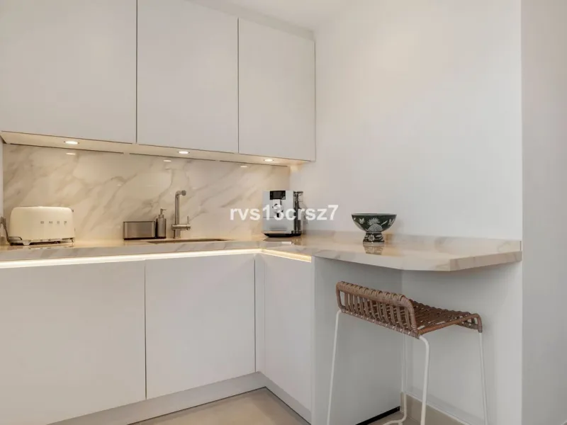 Spacious, recently renovated 3-bedroom apartment in one of the most beautiful and safest urbanizations in Elviria, "St. Maria Village." A 24-hour security community just 5 minutes from the beach, it features several swimming pools and a large, beautifully