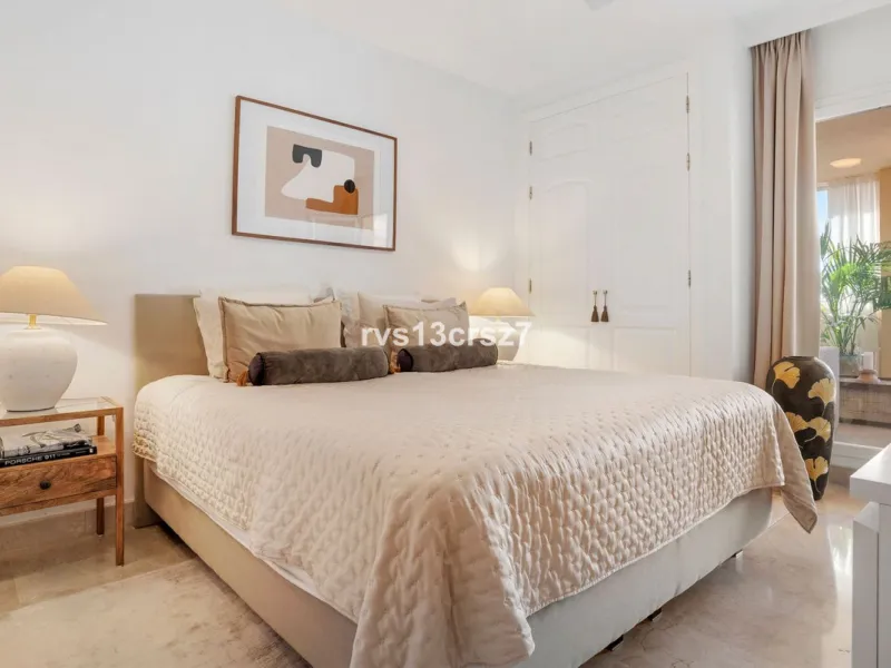 Spacious, recently renovated 3-bedroom apartment in one of the most beautiful and safest urbanizations in Elviria, "St. Maria Village." A 24-hour security community just 5 minutes from the beach, it features several swimming pools and a large, beautifully