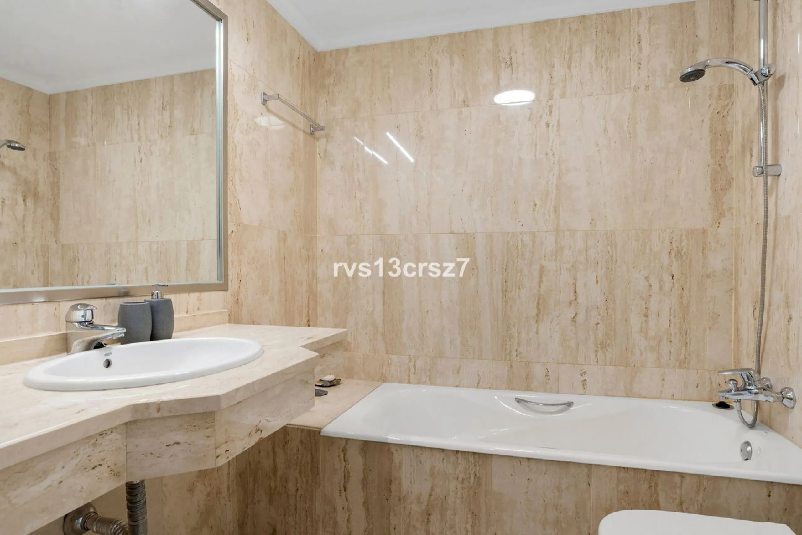 Spacious, recently renovated 3-bedroom apartment in one of the most beautiful and safest urbanizations in Elviria, "St. Maria Village." A 24-hour security community just 5 minutes from the beach, it features several swimming pools and a large, beautifully
