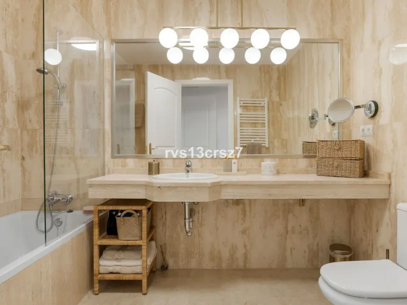 Spacious, recently renovated 3-bedroom apartment in one of the most beautiful and safest urbanizations in Elviria, "St. Maria Village." A 24-hour security community just 5 minutes from the beach, it features several swimming pools and a large, beautifully