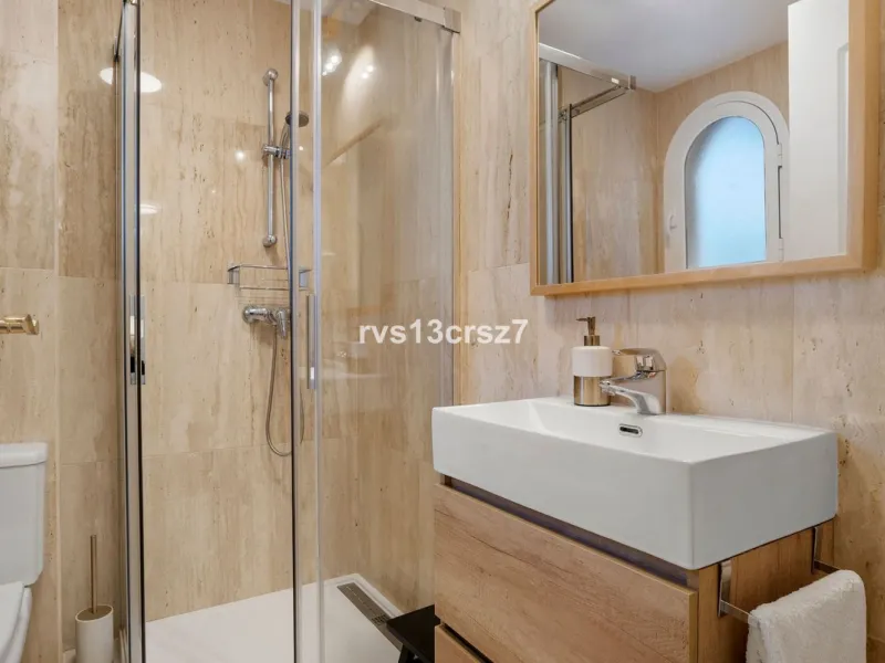 Spacious, recently renovated 3-bedroom apartment in one of the most beautiful and safest urbanizations in Elviria, "St. Maria Village." A 24-hour security community just 5 minutes from the beach, it features several swimming pools and a large, beautifully