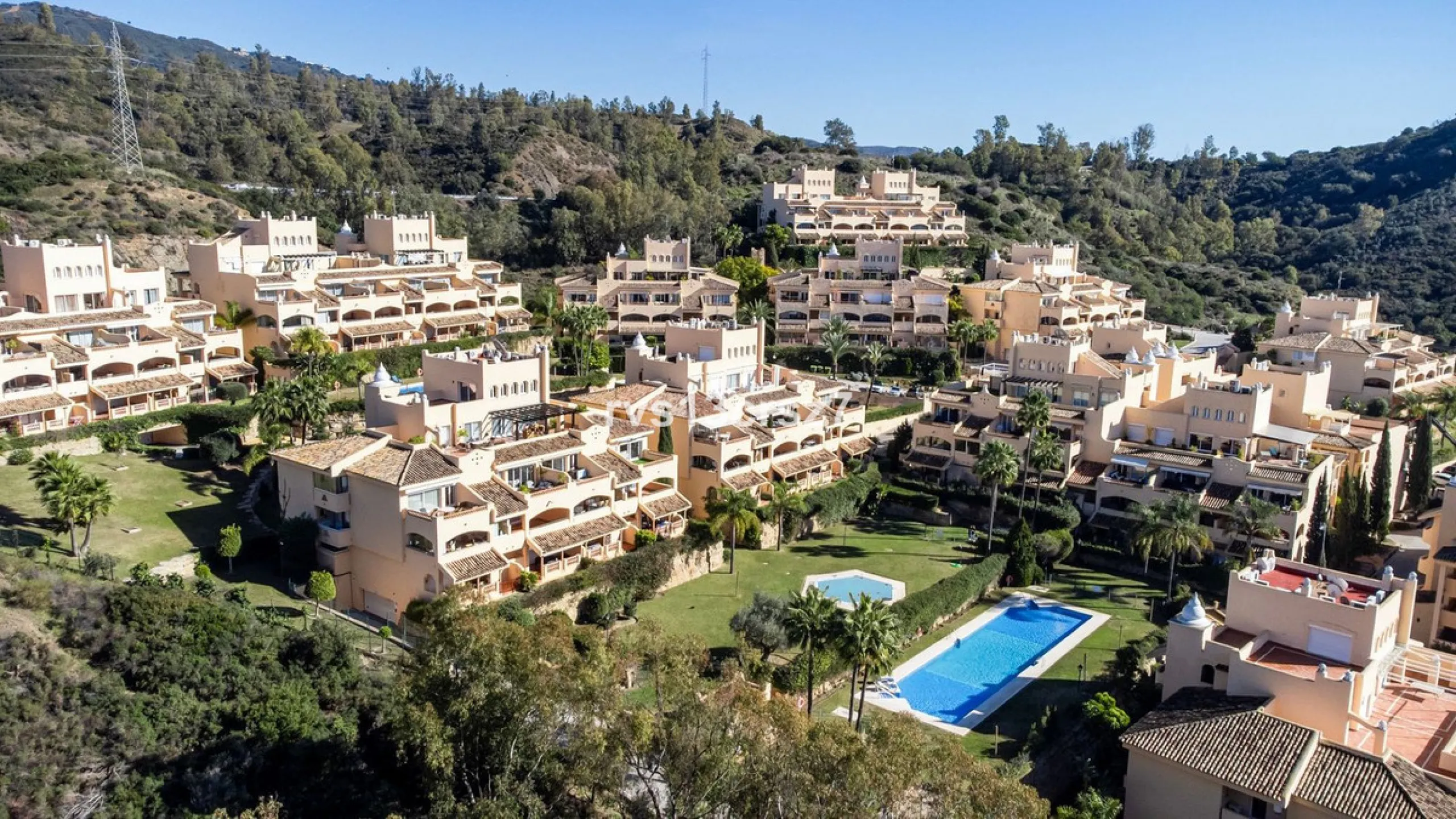 Spacious, recently renovated 3-bedroom apartment in one of the most beautiful and safest urbanizations in Elviria, "St. Maria Village." A 24-hour security community just 5 minutes from the beach, it features several swimming pools and a large, beautifully