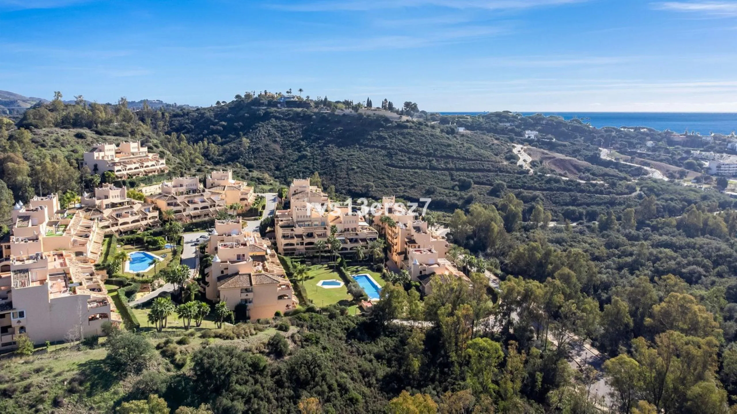 Spacious, recently renovated 3-bedroom apartment in one of the most beautiful and safest urbanizations in Elviria, "St. Maria Village." A 24-hour security community just 5 minutes from the beach, it features several swimming pools and a large, beautifully