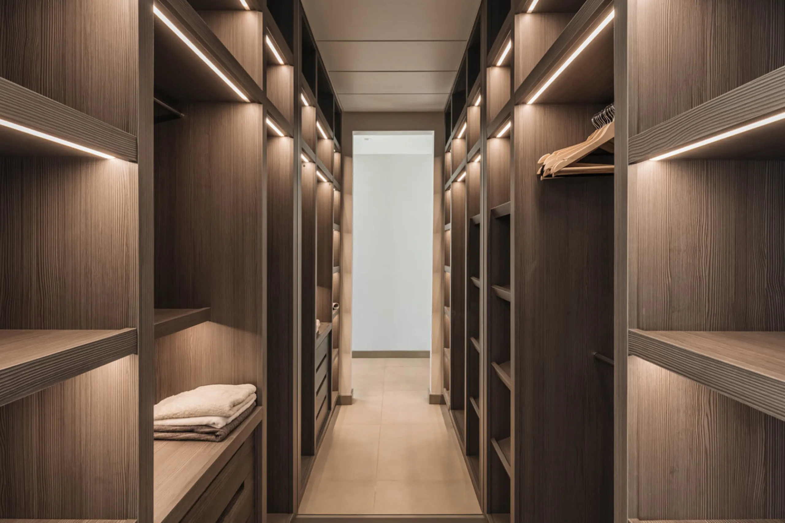 Designed by a distinguished architect, this villa is spread over two levels with an impressive built area. It features five luxurious bedrooms, each with its ensuite bathroom, an additional guest toilet, and a guest apartment that matches the main villa's