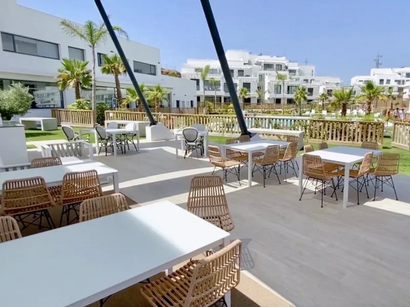 RELOCATION BARGAIN (Reduced for quick sale) Modern luxury 3 bed apartment with private terrace & garden, in top development with gym, spa, tennis etc. In extremely popular La Cala de Mijas beach town. Only 12-15 mins walk to beaches & shopping boulevard. 