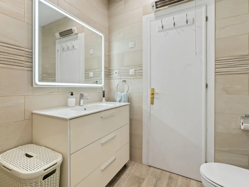 Townhouse located in a small Andalucian pueblo style community in Nueva Atalaya. The property is situated in a quiet cul de sac close to all local amenities, shopping centre, schools and golf. The community boasts a large swimming pool and park sized land