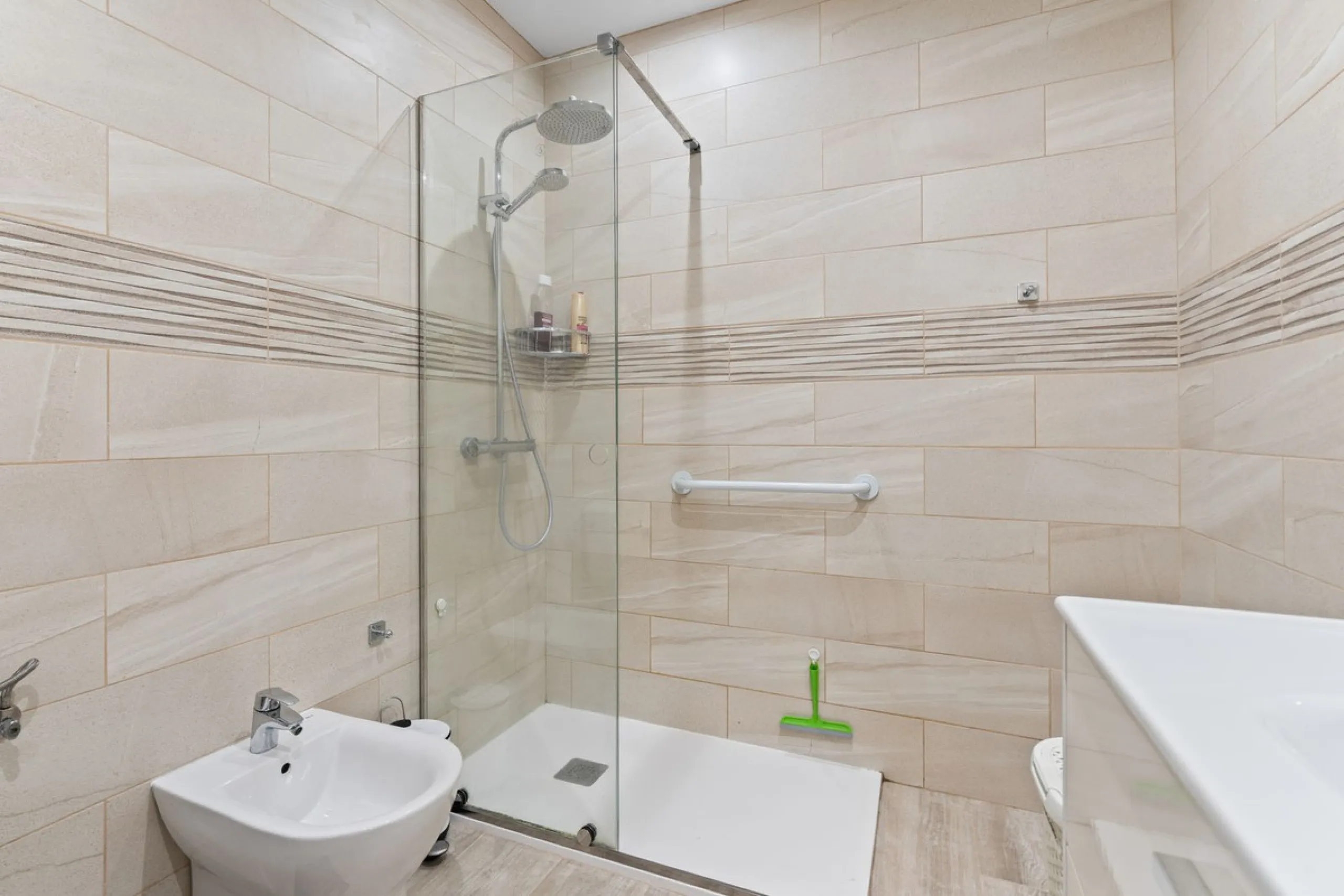 Townhouse located in a small Andalucian pueblo style community in Nueva Atalaya. The property is situated in a quiet cul de sac close to all local amenities, shopping centre, schools and golf. The community boasts a large swimming pool and park sized land